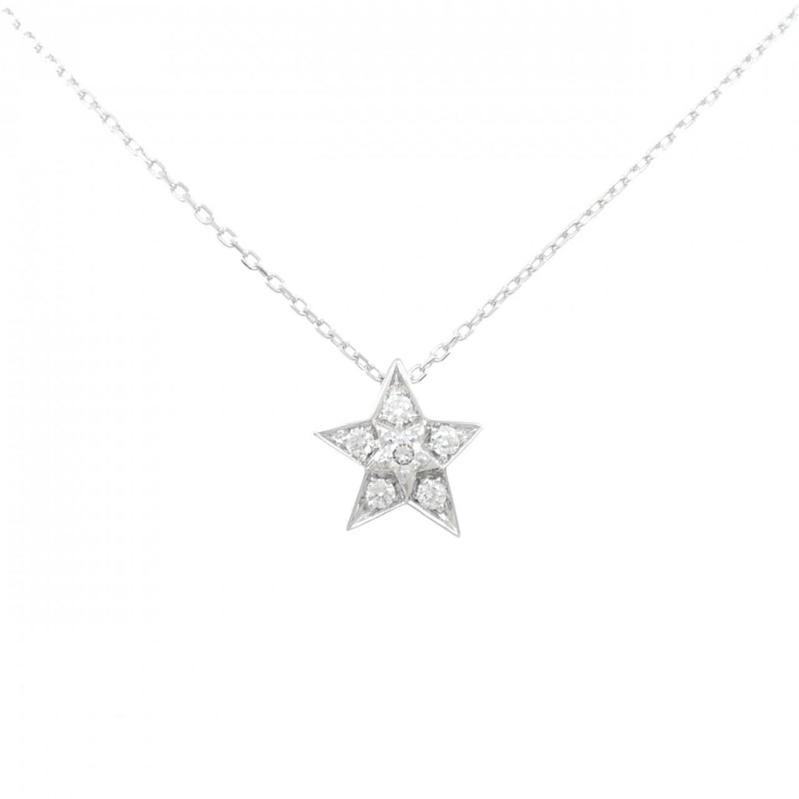 Comet Small Necklace by Chanel: Comet Small Necklace by Chanel Chanel's Comet Small Necklace boasts a sleek white gold design, featuring a stunning diamond pendant. The necklace's adjustable length ensures a comfortable fit for most