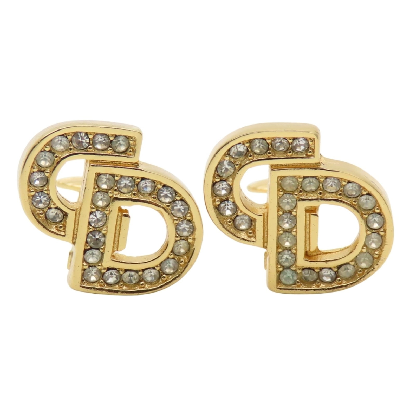 Metal clip earrings by Christian Dior: Metal clip earrings by Christian Dior Metal clip earrings by Christian Dior, featuring intricate details and a touch of luxury. Made from high-quality gold metal with rhinestone accents, these