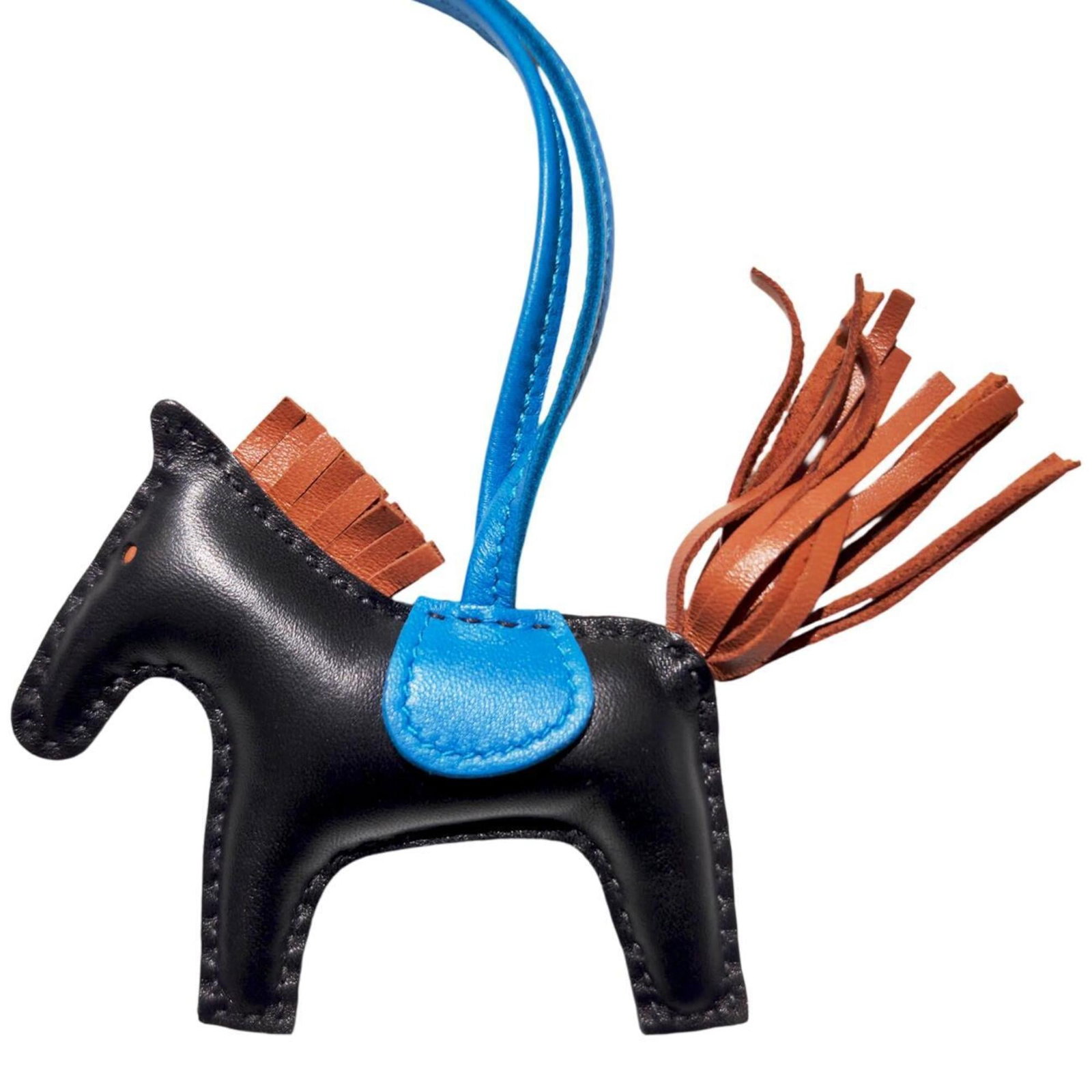 Hermes Handbag Charm Agneau Milo: Hermes Handbag Charm Agneau Milo Agneau Milo Handbag Charm from Hermes features a sleek black and gold design. This used charm has traces of usage, scratches, and dirt but remains in good condition.