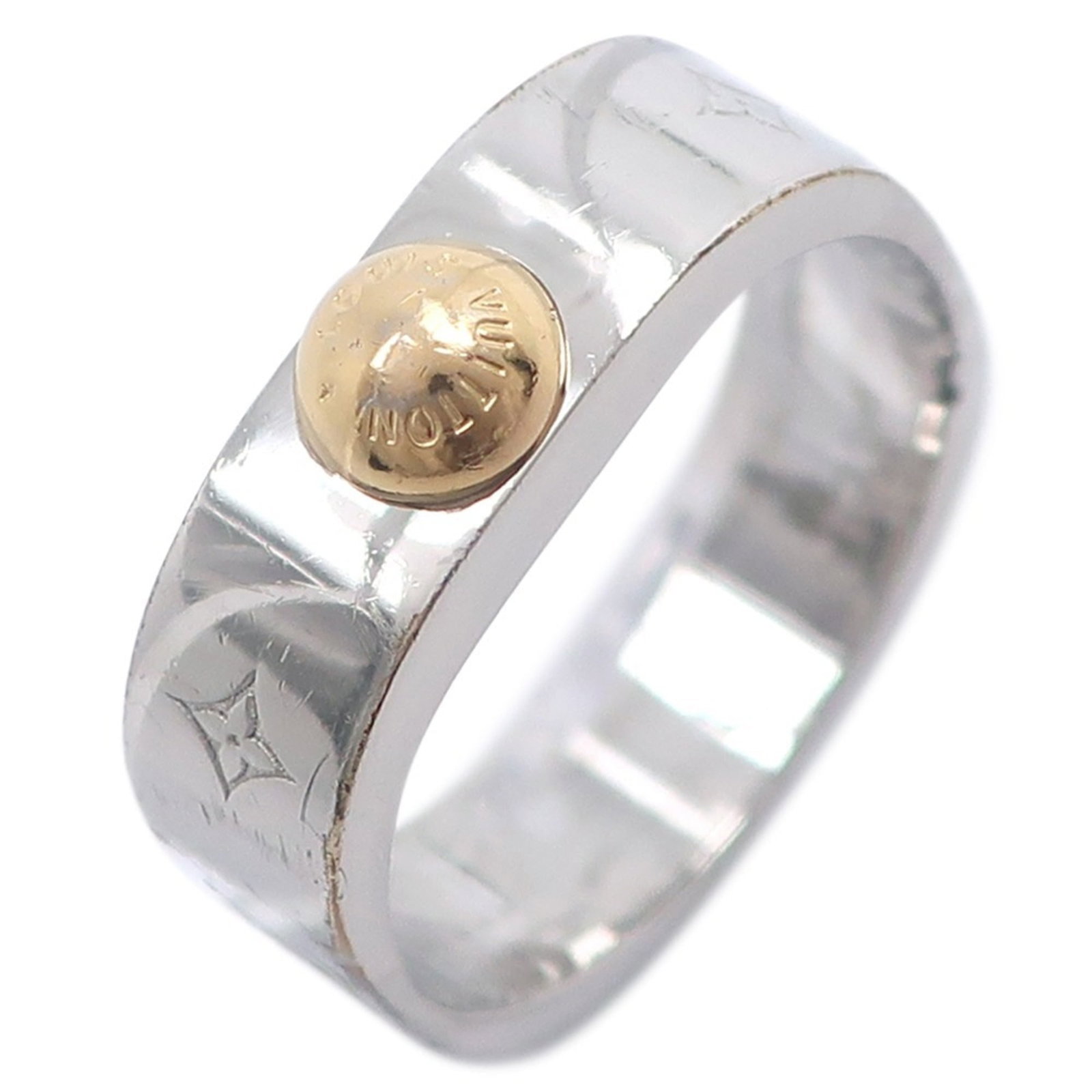 Metal ring band Louis Vuitton: Metal ring band Louis Vuitton Silver Louis Vuitton metal band ring, featuring the iconic LV monogram pattern. The ring shows signs of use and has some minor damages, but remains in acceptable