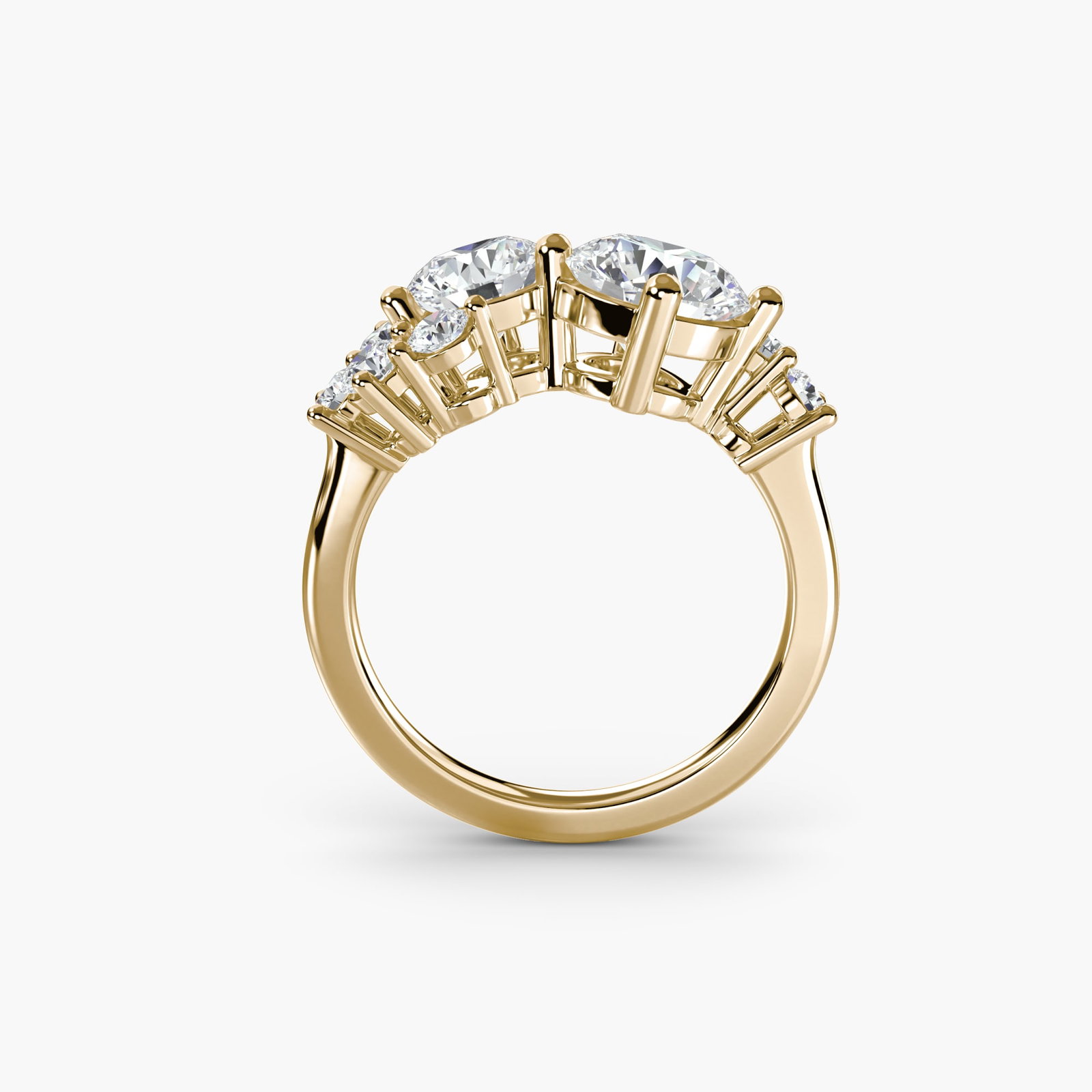 Side Stone Round 18Kt Yellow Gold Ring Setting: Side Stone Round 18Kt Yellow Gold Ring Setting 18Kt Yellow Gold Round Ring Setting with 7 Side Stones. This stunning ring setting features a round shape and 1.21 carats of lab-grown side stones, set i