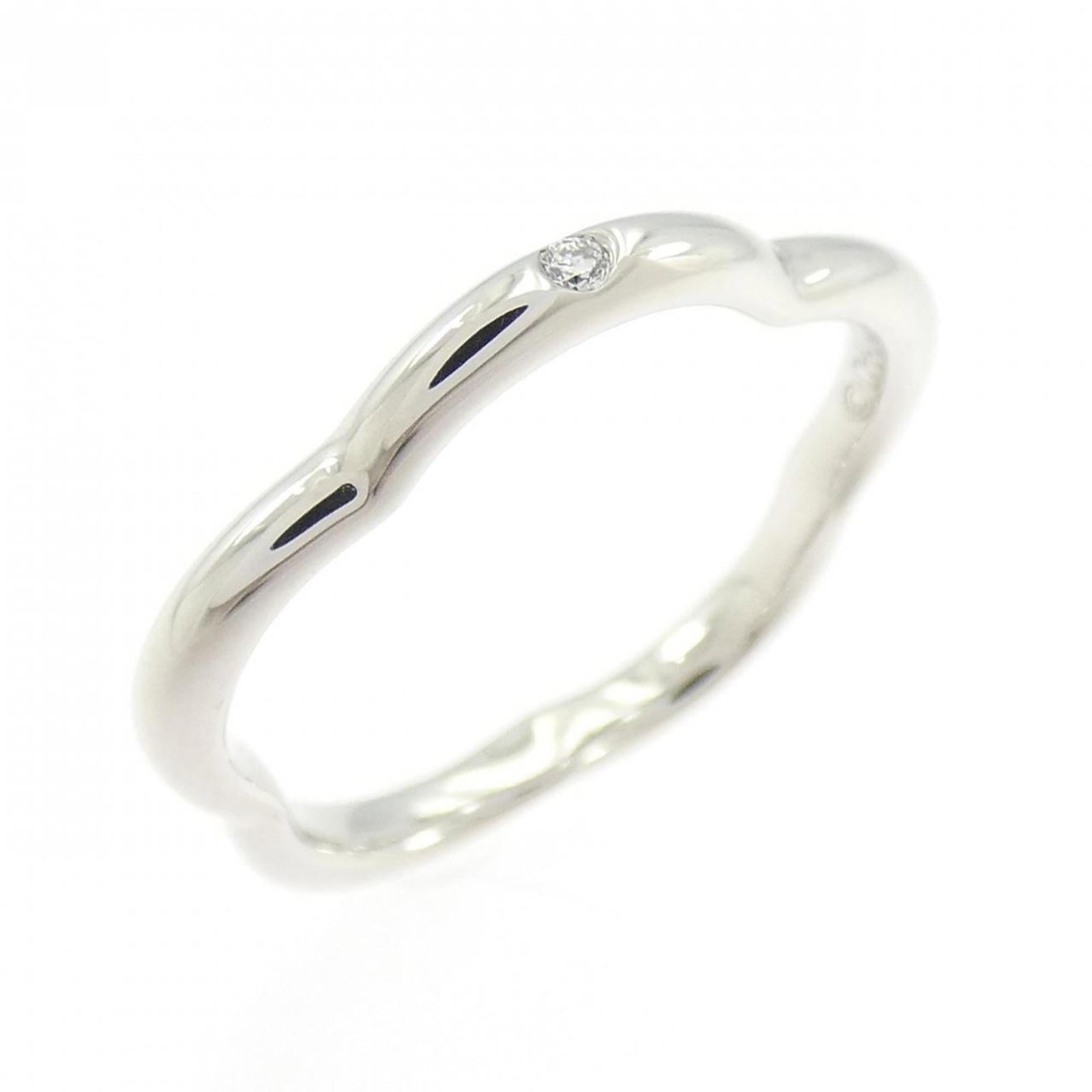 Chanel White Gold Ring Band 18K: Chanel White Gold Ring Band 18K Chanel's iconic White Gold Ring Band 18K boasts understated elegance with its sleek design and premium white gold material, expertly crafted to create a timeless