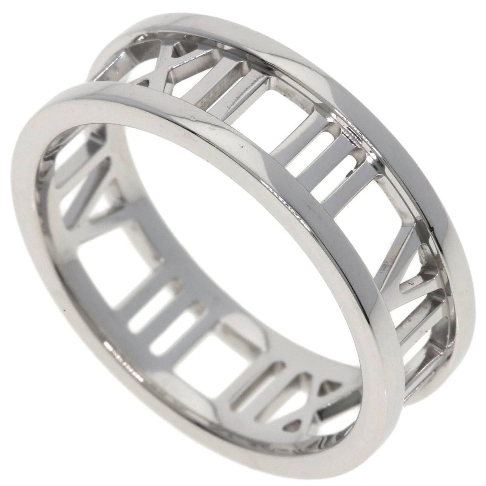 Tiffany Band Ring White Gold (18K): Tiffany Band Ring White Gold (18K) This Tiffany band ring features 18K white gold construction, showcasing the iconic brand's signature style. The ring bears some signs of usage, including minor scrat