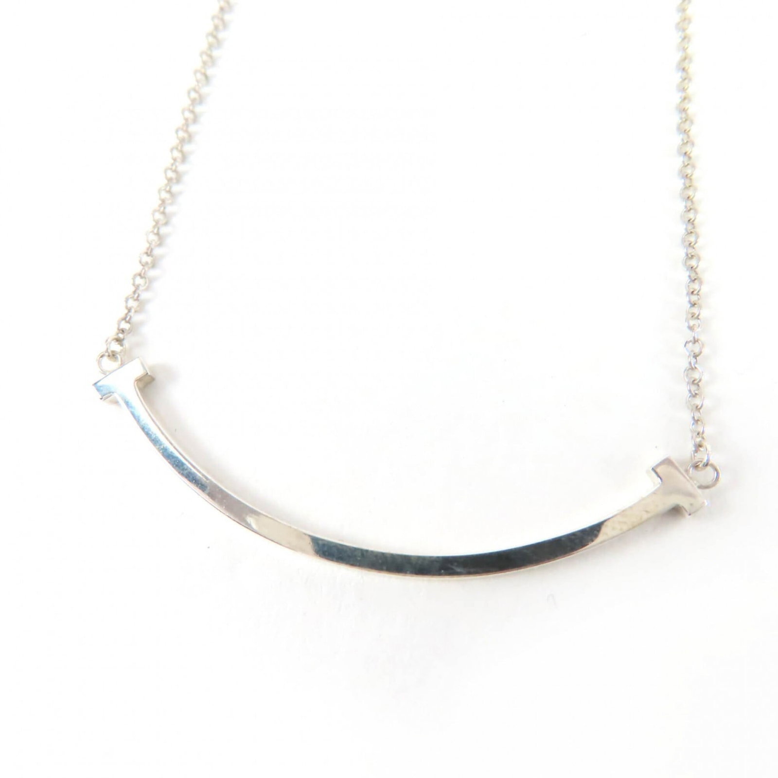 Tiffany&Co. Tiffany T Smile Pendant Small Ag925 Necklace Silver With Storage Bag Weight 2.0G Women'S: Tiffany&Co. Tiffany T Smile Pendant Small Ag925 Necklace Silver With Storage Bag Weight 2.0G Women'S Small Tiffany&Co. Tiffany T Smile Pendant in sterling silver, weighing 2g, features a delicate