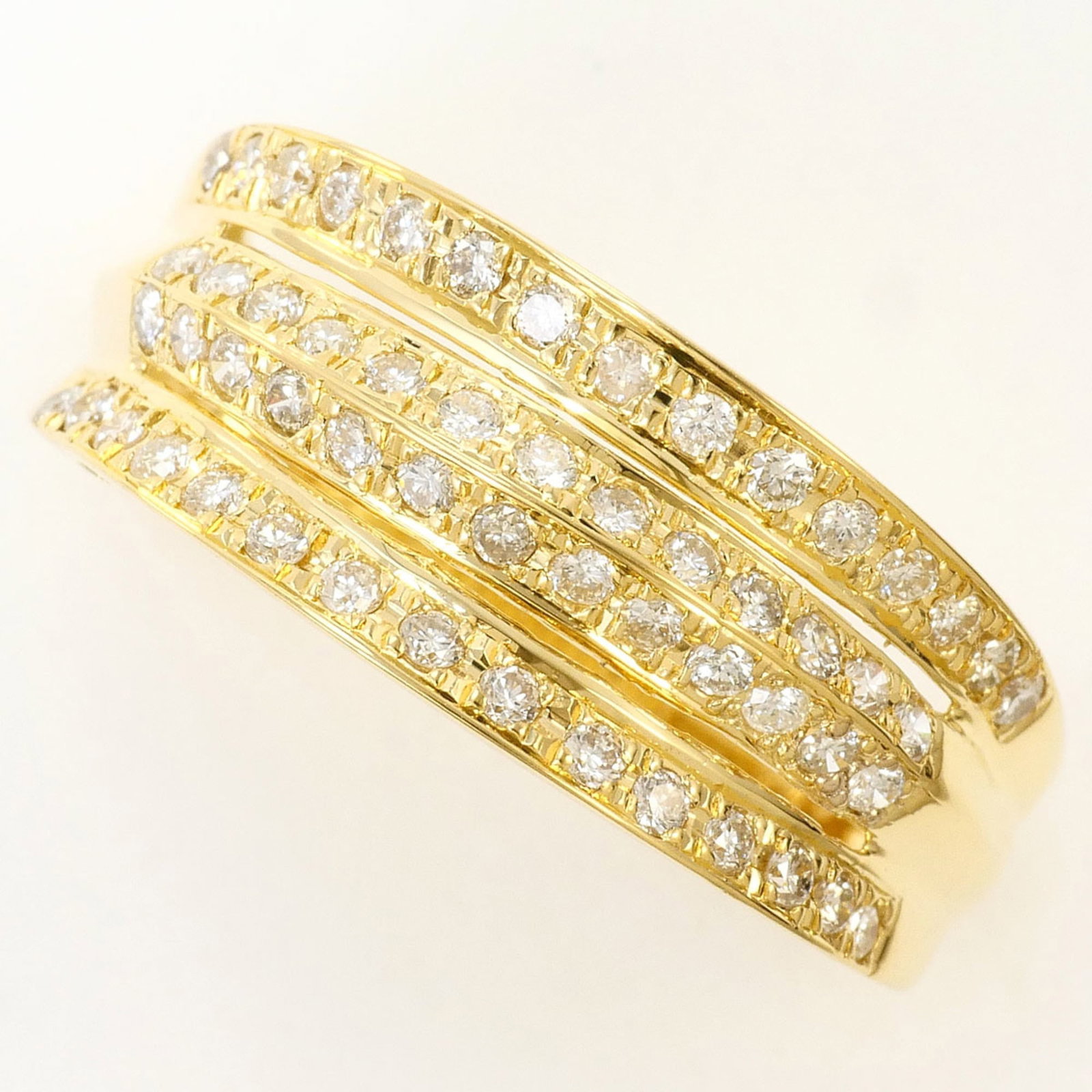 Unbranded Band Ring Yellow Gold (18K): Unbranded Band Ring Yellow Gold (18K) Yellow gold band ring with a 0.70 carat diamond, weighing 4.2g, in a women's size 6.5, crafted from 18K yellow gold material. This 18K yellow gold band features