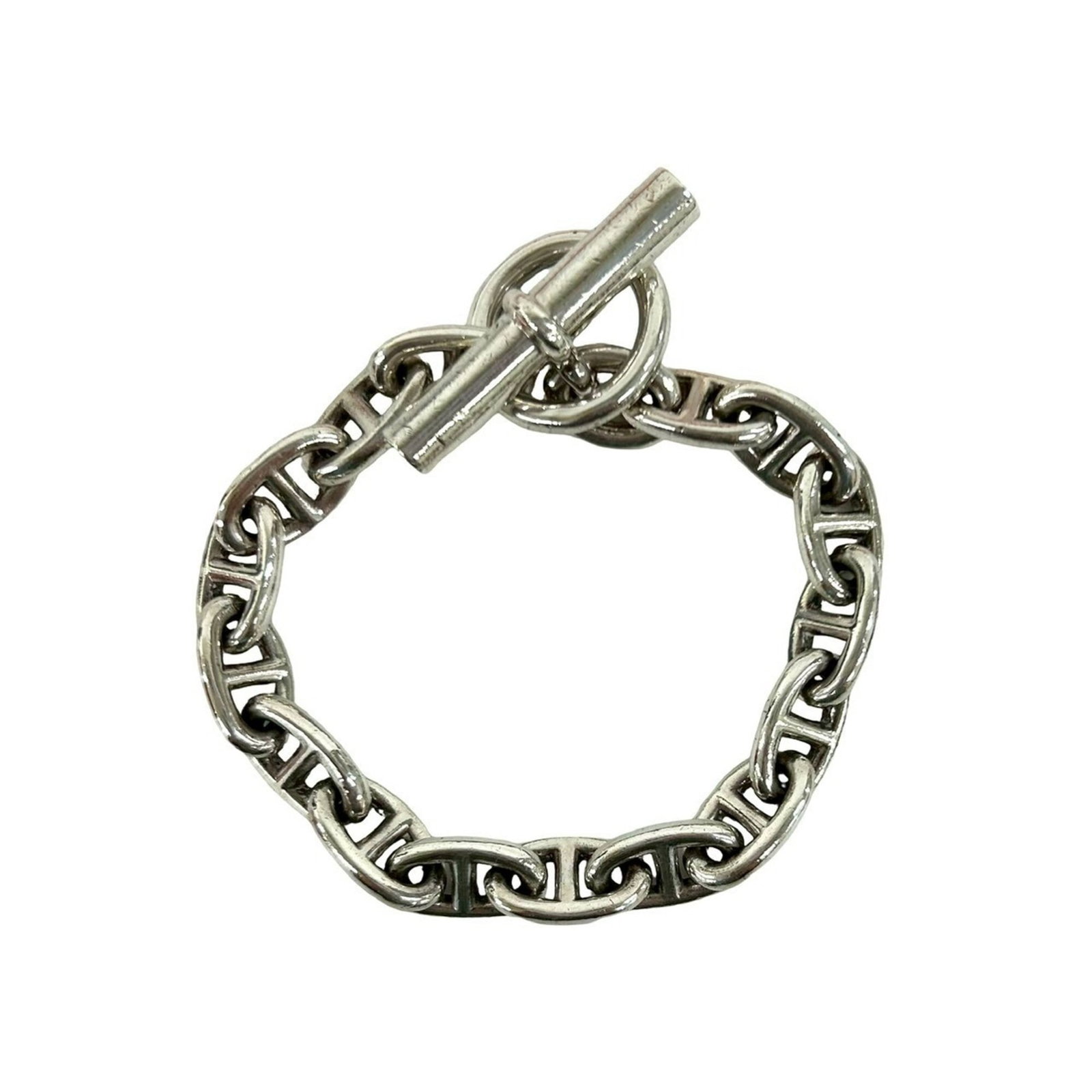 Silver Charm Bracelet 925 by Hermes: Silver Charm Bracelet 925 by Hermes Silver Charm Bracelet 925 by Hermes, a sophisticated accessory featuring the iconic charm style from the renowned French fashion house. This 20.5cm silver bracelet 