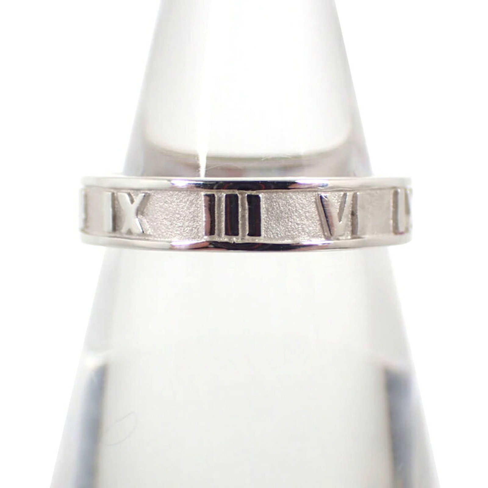 Sterling Silver Ring Tiffany Band: Sterling Silver Ring Tiffany Band Sterling Silver Ring Tiffany Band - A Pre-Owned Women's Band in Excellent Condition. This 50mm sterling silver band features the iconic Tiffany brand and has a few