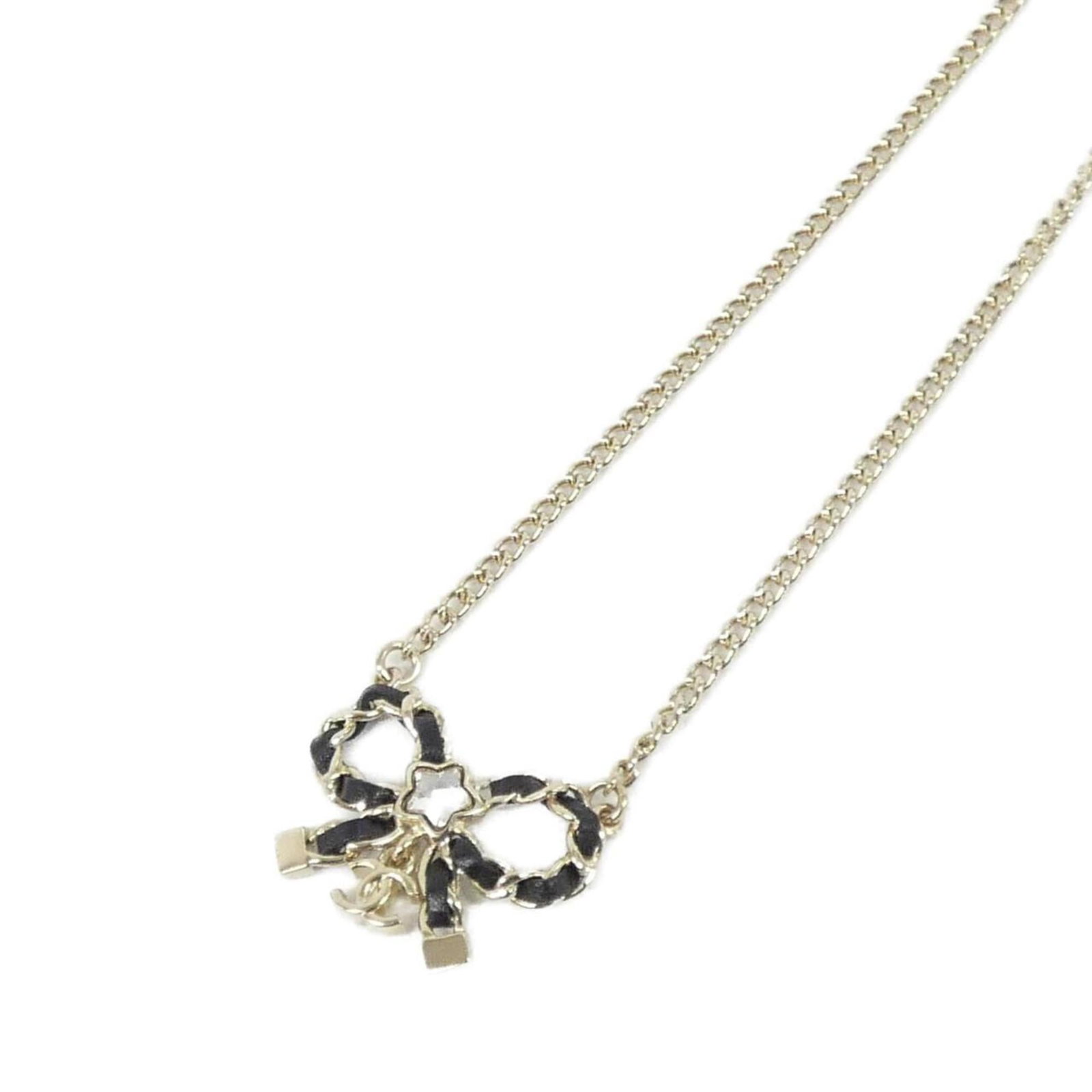 Abg277 Necklace By Chanel: Abg277 Necklace By Chanel The Abg277 Necklace by Chanel boasts sleek, black leather and crystal accents in a timeless design. With its 22mm x 33mm crystal pendant suspended from a calfskin chain, this