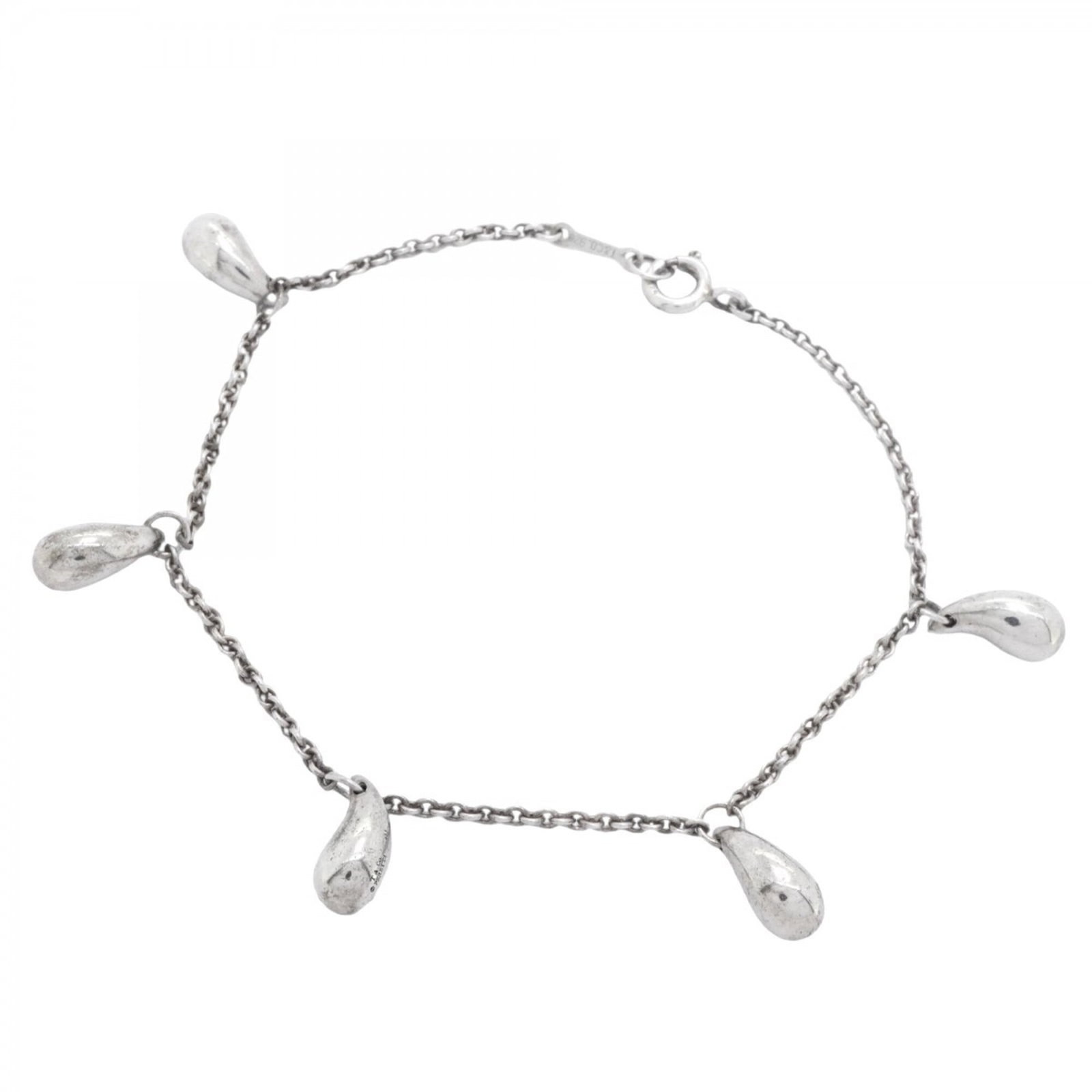 Charm Tiffany Bracelet 925 Silver: Charm Tiffany Bracelet 925 Silver This 925 silver Charm Tiffany Bracelet features a classic design with subtle signs of wear, reflecting its used condition. The bracelet measures 17.5cm in length and