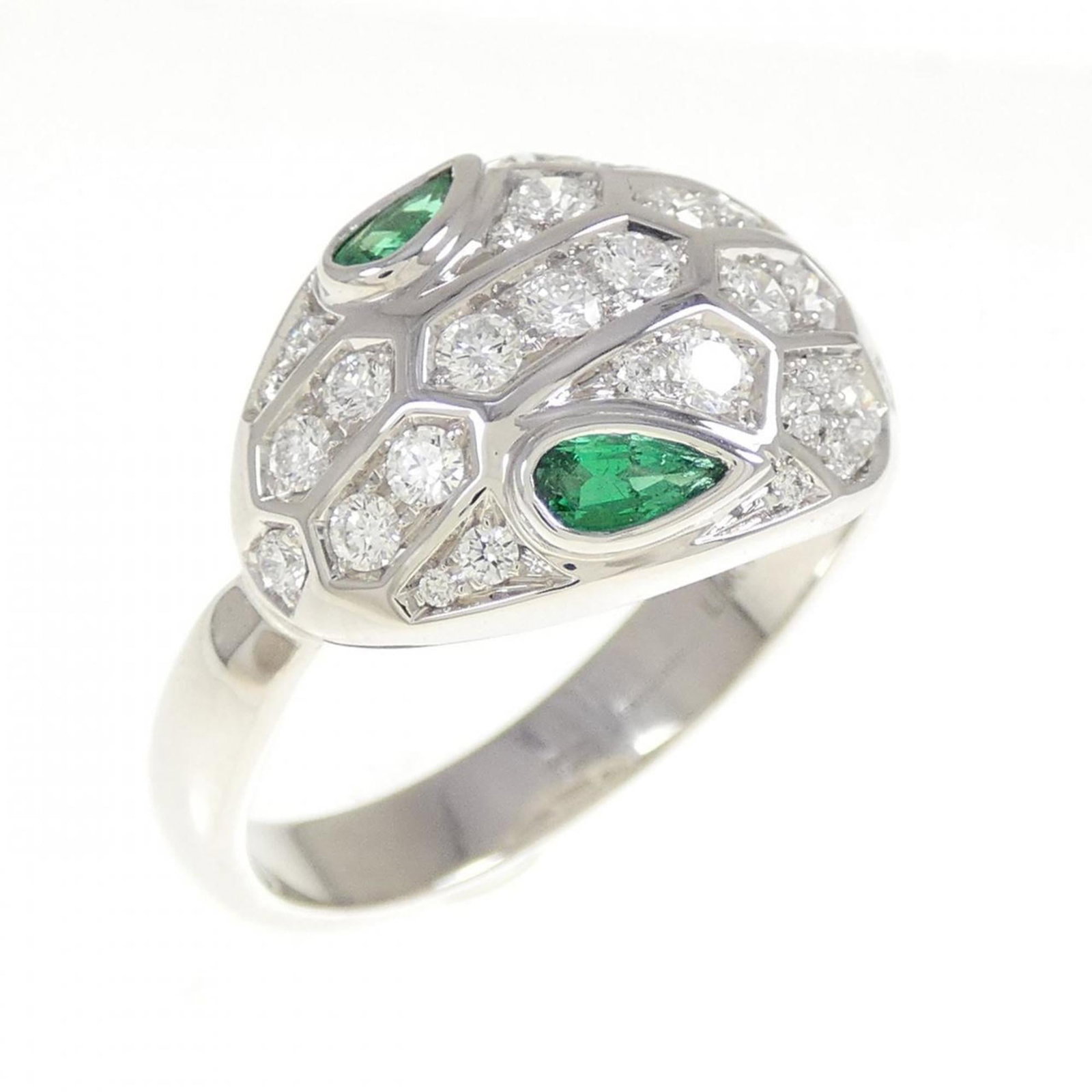 Bvlgari Band Ring White Gold (18K): Bvlgari Band Ring White Gold (18K) Bvlgari Band Ring White Gold (18K) - A stylish and elegant men's band ring featuring a diamond and emerald stone set in 18K white gold. The ring boasts a classic