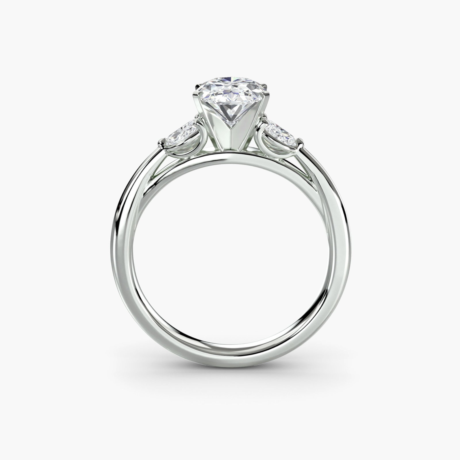 Side Stone Oval 14Kt White Gold Ring Setting: Side Stone Oval 14Kt White Gold Ring Setting Oval ring setting crafted from 14Kt white gold, featuring four side stones weighing 0.43 carats total. The ring's oval shape and slender band width of