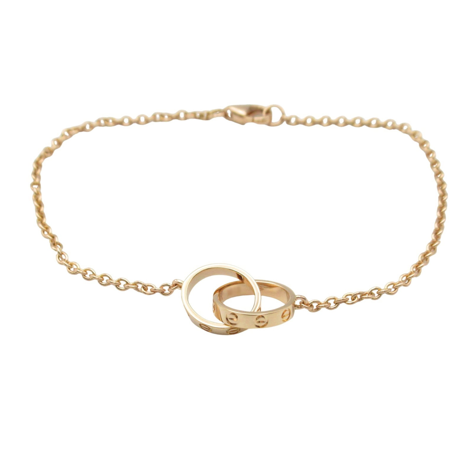 Pink Gold Charm Bracelet Cartier: Pink Gold Charm Bracelet Cartier Pink Gold Charm Bracelet Cartier features 18K pink gold construction, with a classic charm bracelet design. The item bears a signature and has some traces of usage, in