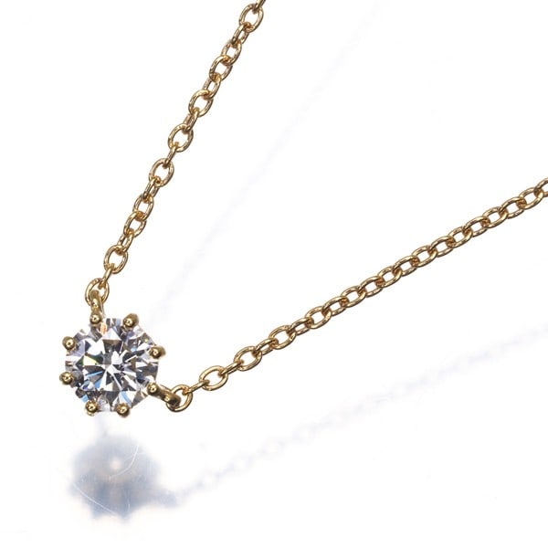 Ahkah Necklace Diamond 0.15Ct Saltier Round Solitaire 18K 750 Yellow Gold: Ahkah Necklace Diamond 0.15Ct Saltier Round Solitaire 18K 750 Yellow Gold The Ahkah Necklace features a stunning 0.15Ct saltier round diamond solitaire set in 18k yellow gold, with the metal purity an