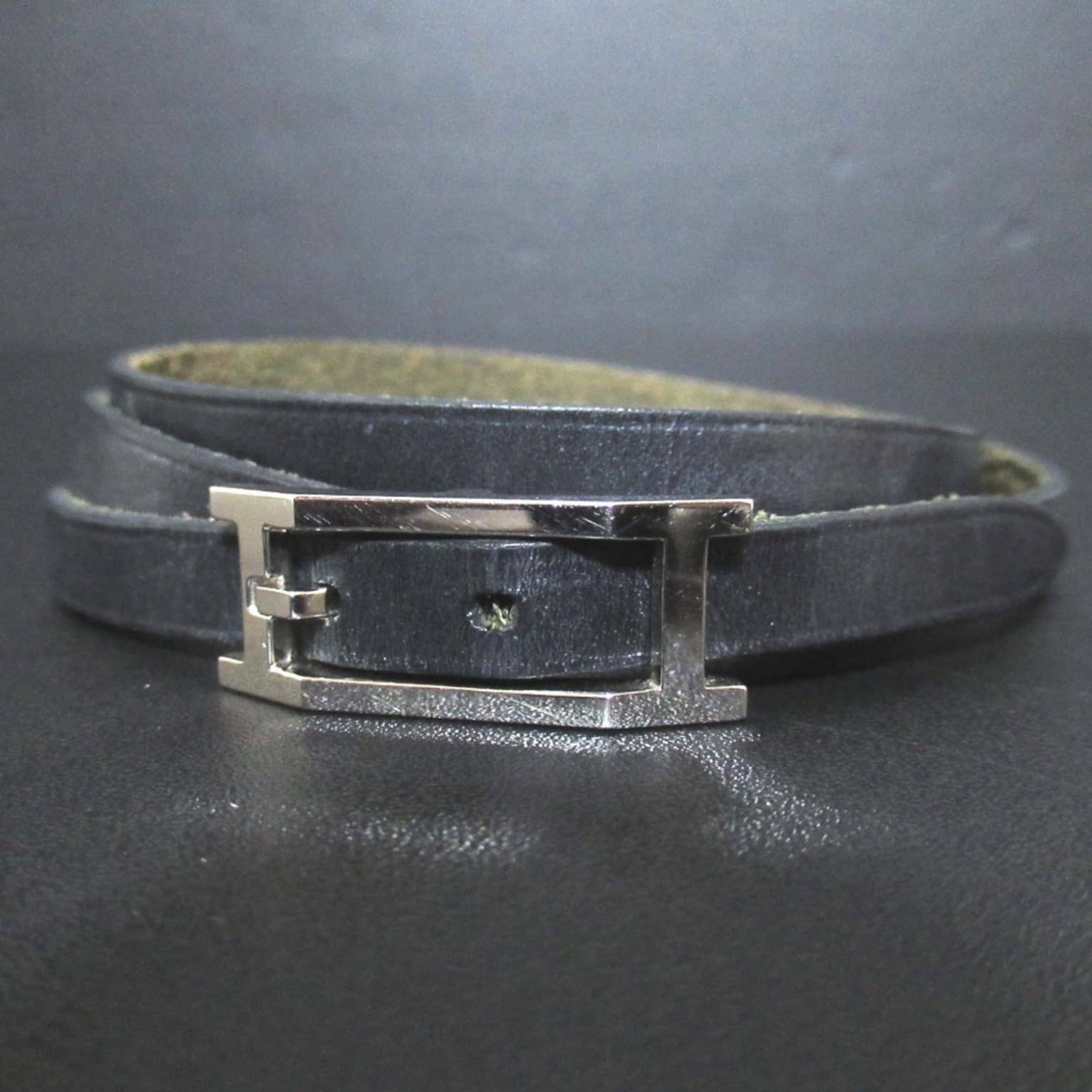 Charm Bracelet by Hermes: Charm Bracelet by Hermes The Hermes Charm Bracelet boasts sleek, sophisticated design with a subtle black and silver hue. Its compact length of 14-16cm makes it a versatile accessory for everyday