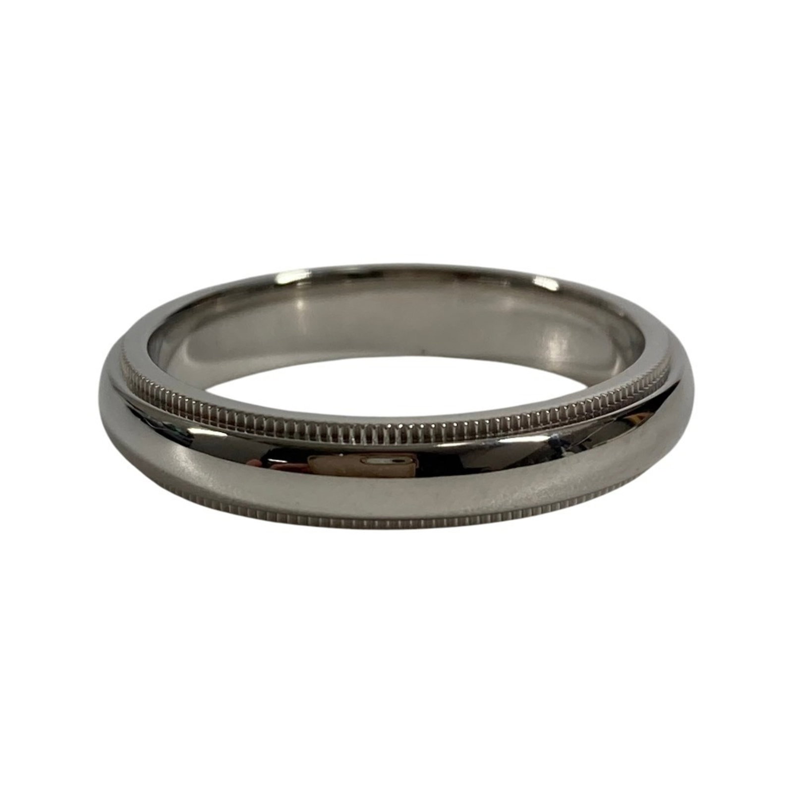 Platinum ring by Tiffany band: Platinum ring by Tiffany band Platinum ring by Tiffany features a sleek band design made from high-quality platinum material. This men's ring boasts a classic style with a 950 platinum composition,