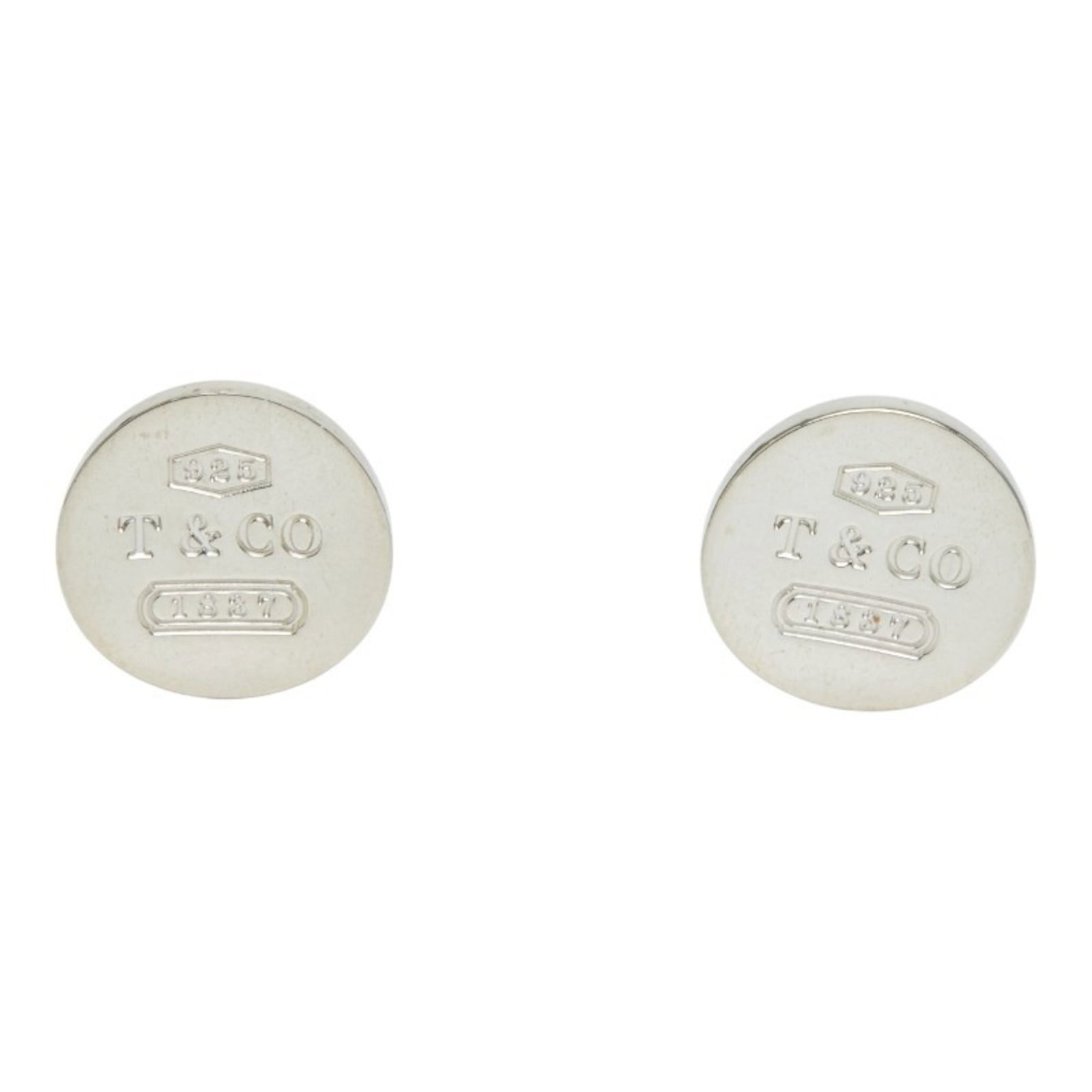 Silver cufflinks Tiffany 925: Silver cufflinks Tiffany 925 Silver cufflinks Tiffany 925 are crafted from high-quality silver, measuring 15.70mm x 15.70mm in size and weighing 13.3g. These used cufflinks exhibit traces of usage