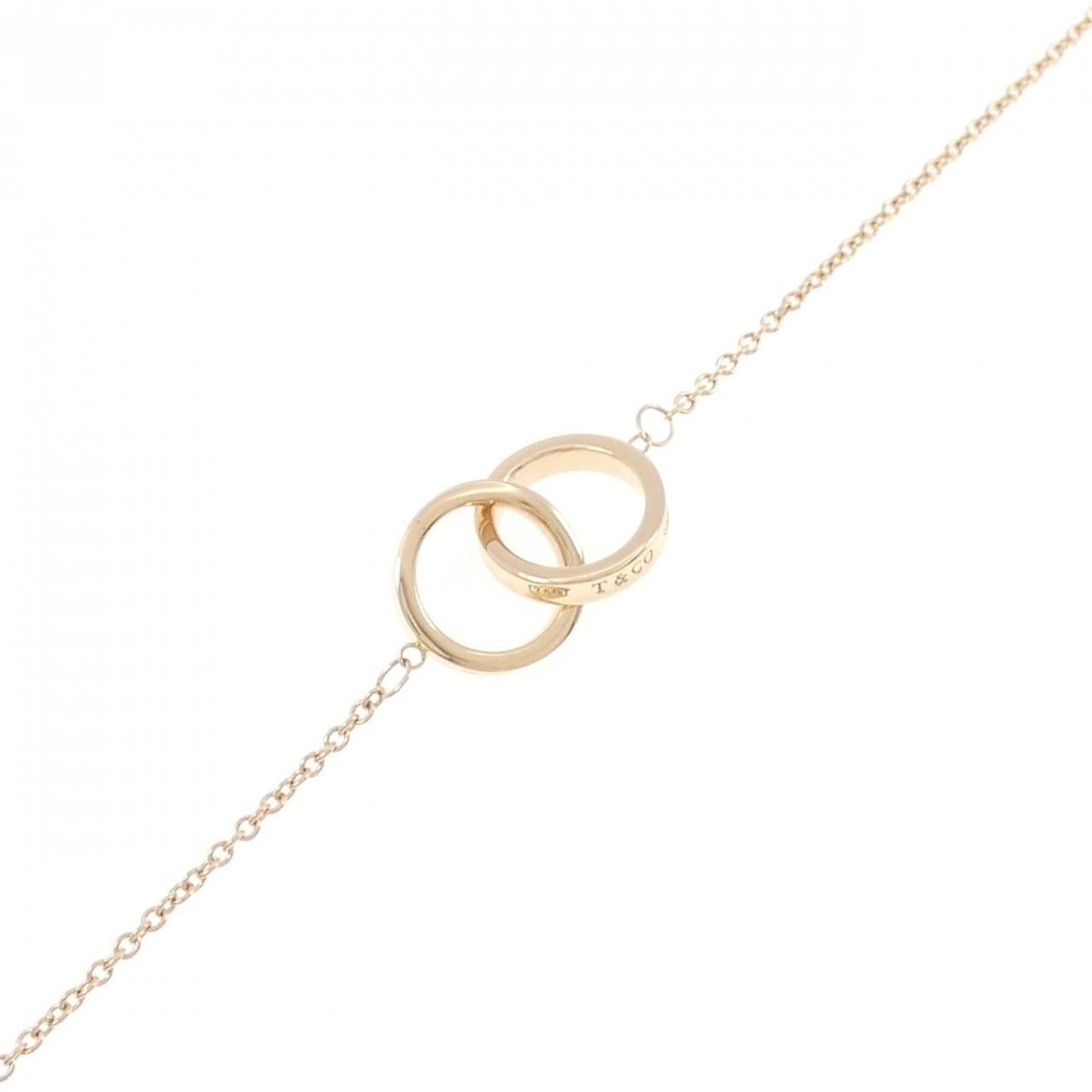 Tiffany Charm of Bracelet: Tiffany Charm of Bracelet Tiffany's iconic charm bracelet shines with its 18K gold pink metal, carefully crafted to add a touch of elegance to any outfit. Measuring 15.5-18cm in length, this versatile