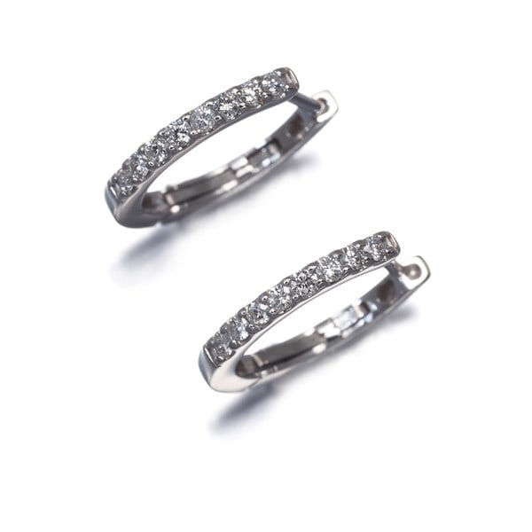 Diamond 0.10Ct/ 0.10Ct Hoop Earrings 18K 750 White Gold: Diamond 0.10Ct/ 0.10Ct Hoop Earrings 18K 750 White Gold 18k White Gold Hoop Earrings feature two natural diamonds, each measuring 0.10 carats, set in a classic hoop design that exudes timeless eleganc