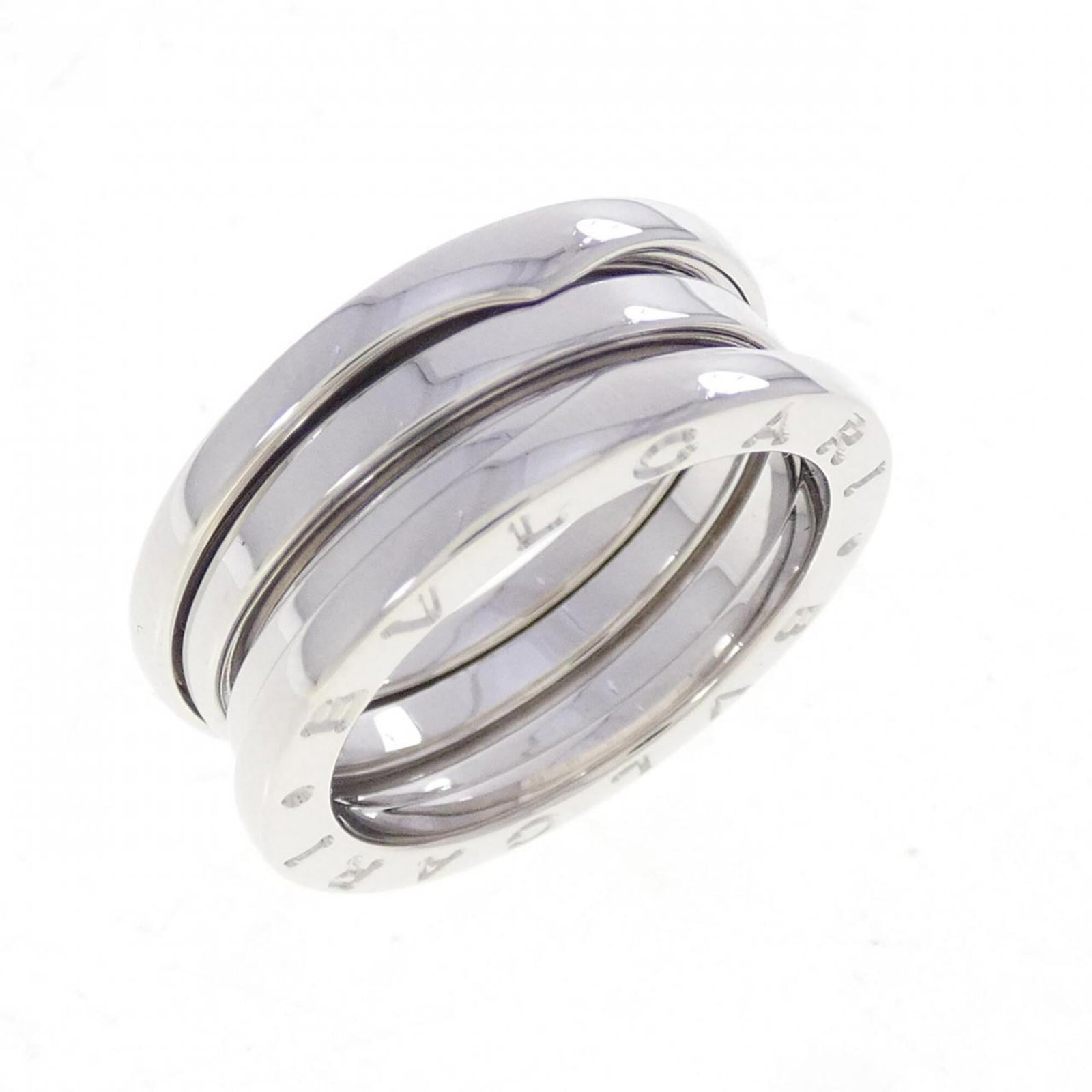 Bvlgari Band Ring White Gold (18K): Bvlgari Band Ring White Gold (18K) Bvlgari Band Ring White Gold (18K) - A sleek and sophisticated band ring in white gold, featuring the iconic Bvlgari design. Made from high-quality 18K white gold, t