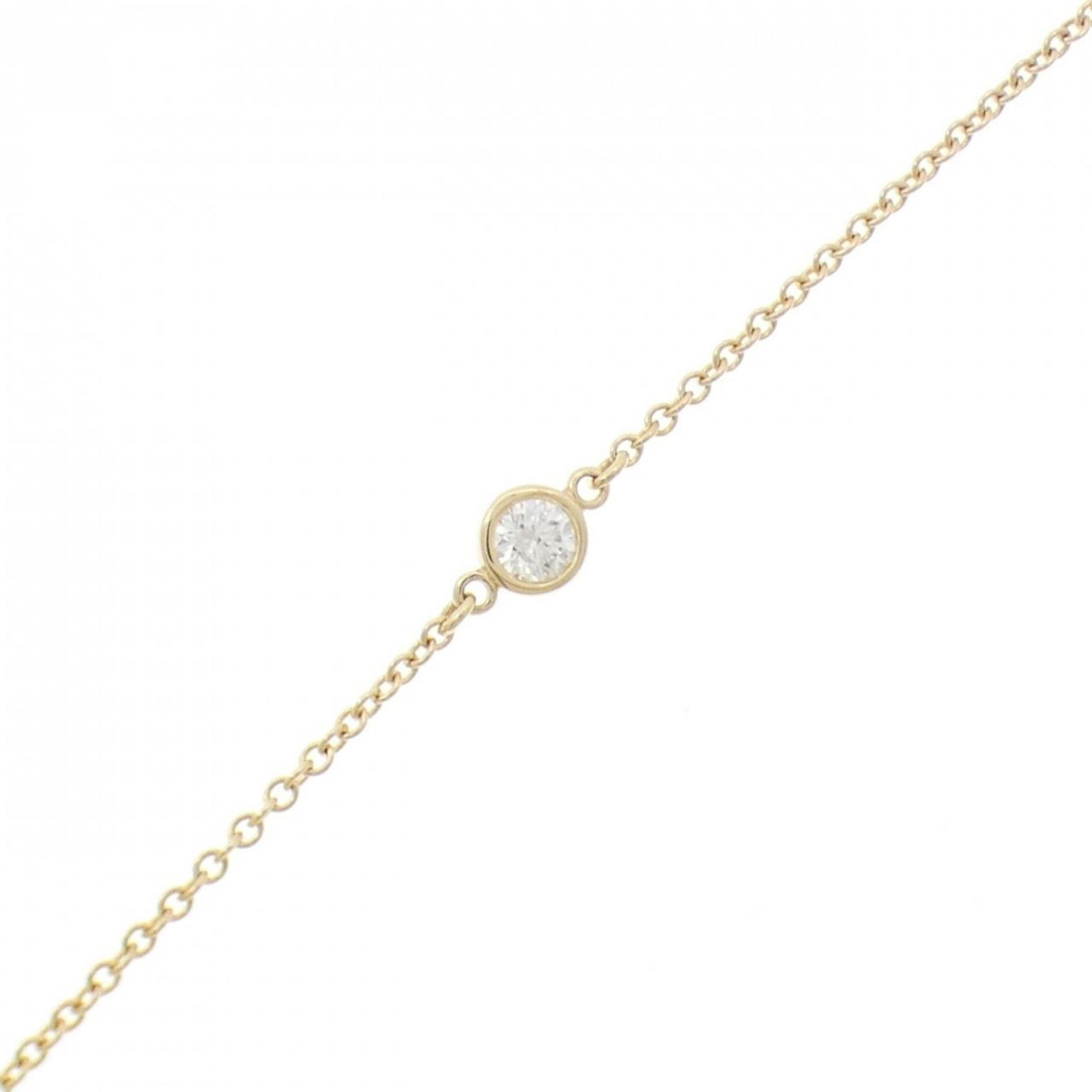 Tiffany Charm Bracelet Yellow Gold (18K): Tiffany Charm Bracelet Yellow Gold (18K) Yellow gold (18K) Tiffany charm bracelet with diamond stone, measuring 7.08 inches in length, bears a signature and is made from high-quality yellow gold. The 