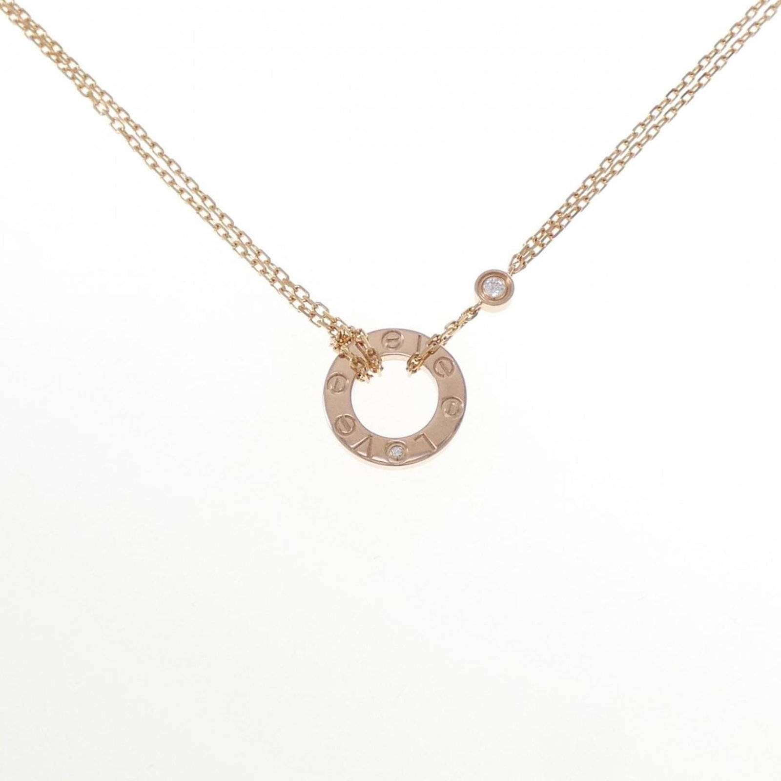 Love necklace from Cartier: Love necklace from Cartier Pink gold (18K) Cartier necklace featuring a diamond weight of 6.2g, set against a pink gold background with a diameter of 13mm and width of 1.2mm. The necklace falls