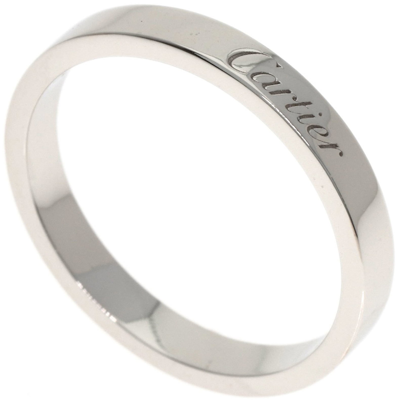 Ring Band by Platinum 950: Ring Band by Platinum 950 Platinum 950 band ring by Cartier, featuring a sleek and modern design with a width of 3mm. This used ring shows some signs of wear, including scratches and minor dirt, but r