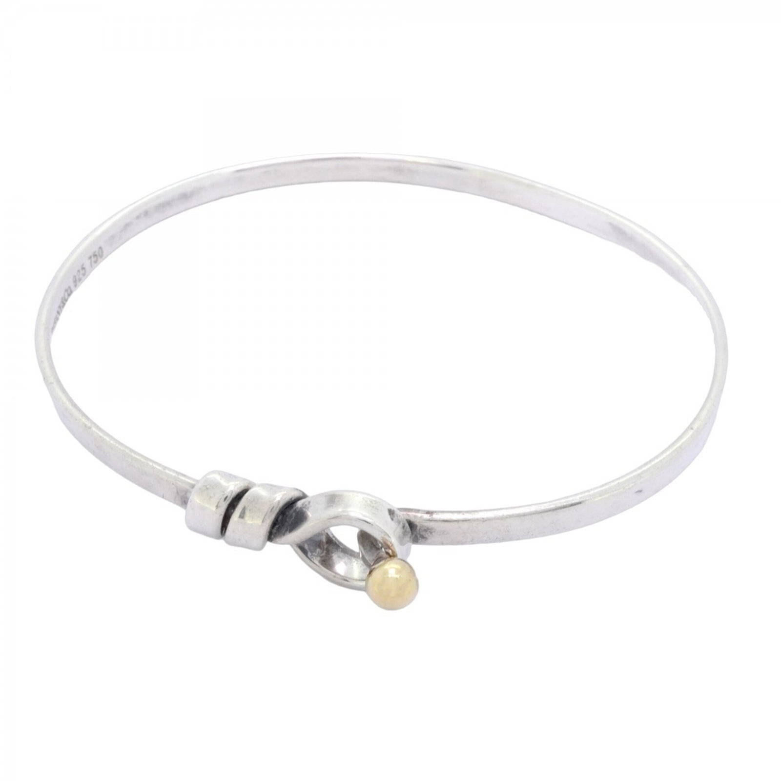 Tiffany Bangle Silver 925 Yellow Gold (18K): Tiffany Bangle Silver 925 Yellow Gold (18K) Silver and yellow gold 18K bangle from Tiffany, with a length of 16.5cm / 6.49''. The bangle bears traces of usage, scratches, and dirt, but remains in good