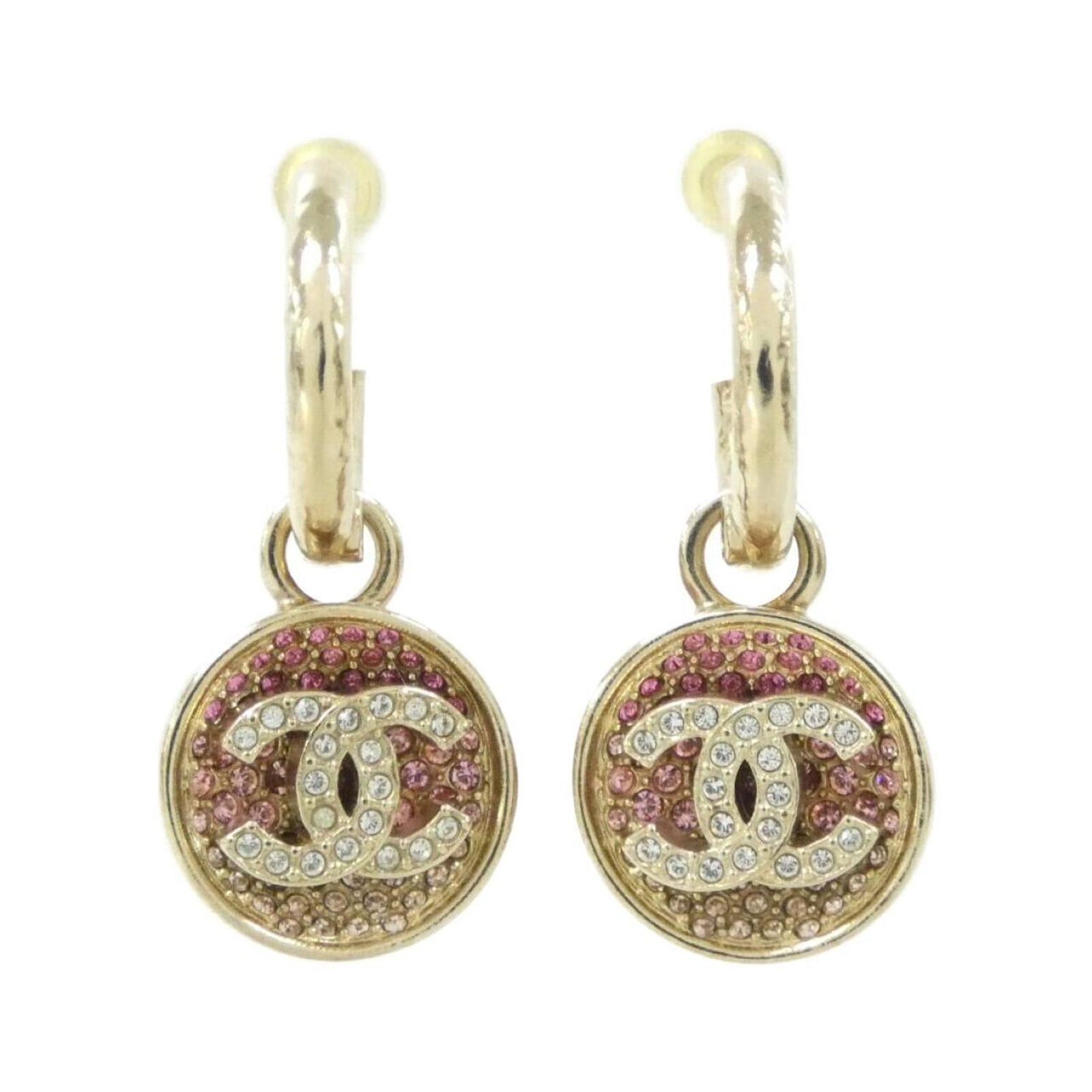 Chanel Stud Earrings: Chanel Stud Earrings Stud earrings featuring the iconic Chanel design, crafted in gold with crystal accents. The subtle pink stone adds a touch of elegance to these understated yet sophisticated acces