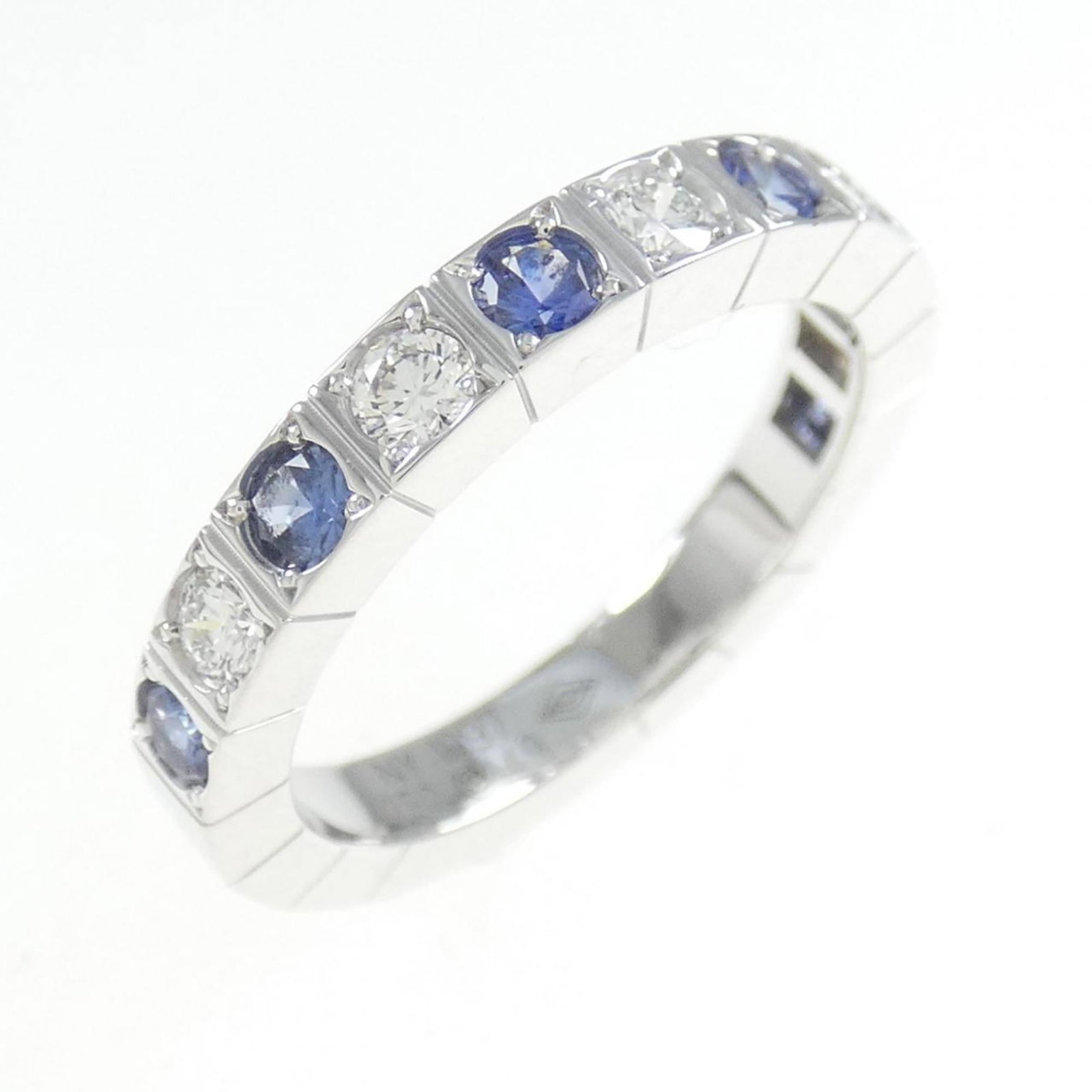 White Gold Cartier Band Ring 18K: White Gold Cartier Band Ring 18K White Gold Cartier Band Ring 18K features an elegant design with a diamond and sapphire stone, set in high-quality 18K white gold. This 49 US size band ring boasts a