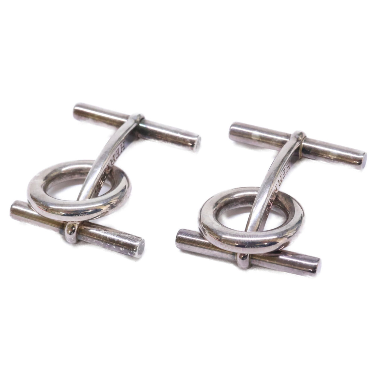 Hermes Cufflinks Silver 925: Hermes Cufflinks Silver 925 Silver 925 Hermes Cufflinks - Used in Good Condition, Showing Signs of Wear. These cufflinks feature the iconic Hermes brand and are made from high-quality silver. With the