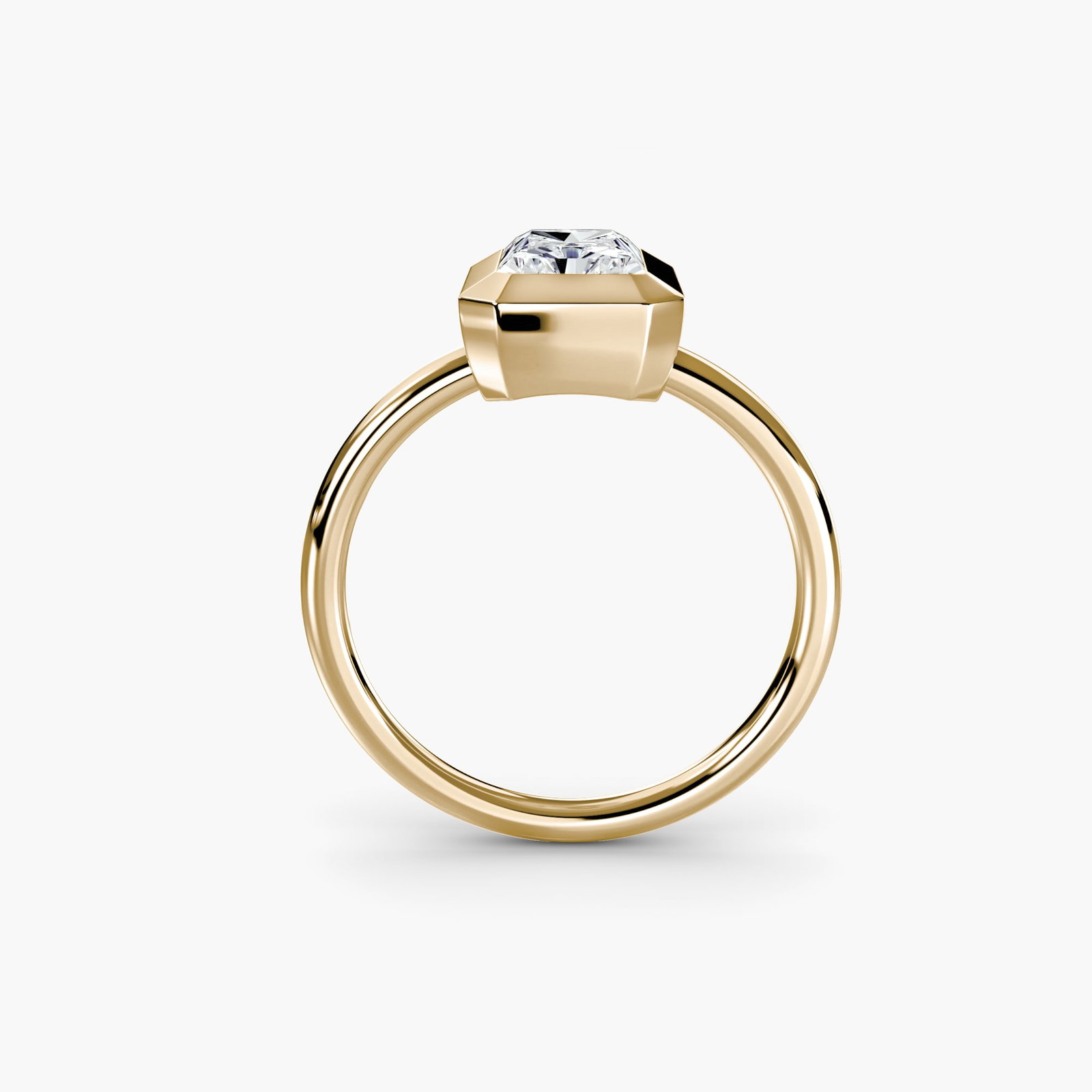Solitaire Radiant 14Kt Yellow Gold Ring Setting: Solitaire Radiant 14Kt Yellow Gold Ring Setting Radiant 14Kt Yellow Gold Ring Setting for the perfect centerpiece. This stunning setting boasts a classic radiance with its 1.8mm band width and 3.14