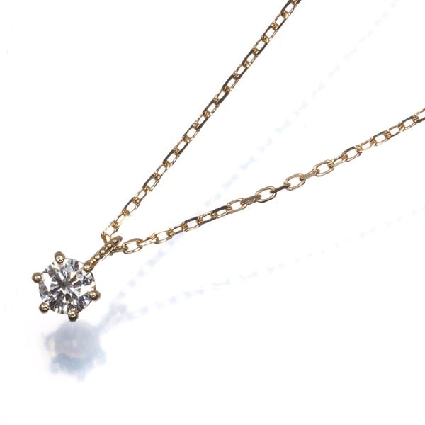 Diamond Solitaire Necklace in 18K Yellow Gold: Diamond Solitaire Necklace in 18K Yellow Gold Diamond Solitaire Necklace in 18K Yellow Gold features a natural diamond set in an 18k yellow gold pendant. The necklace showcases the beauty of a