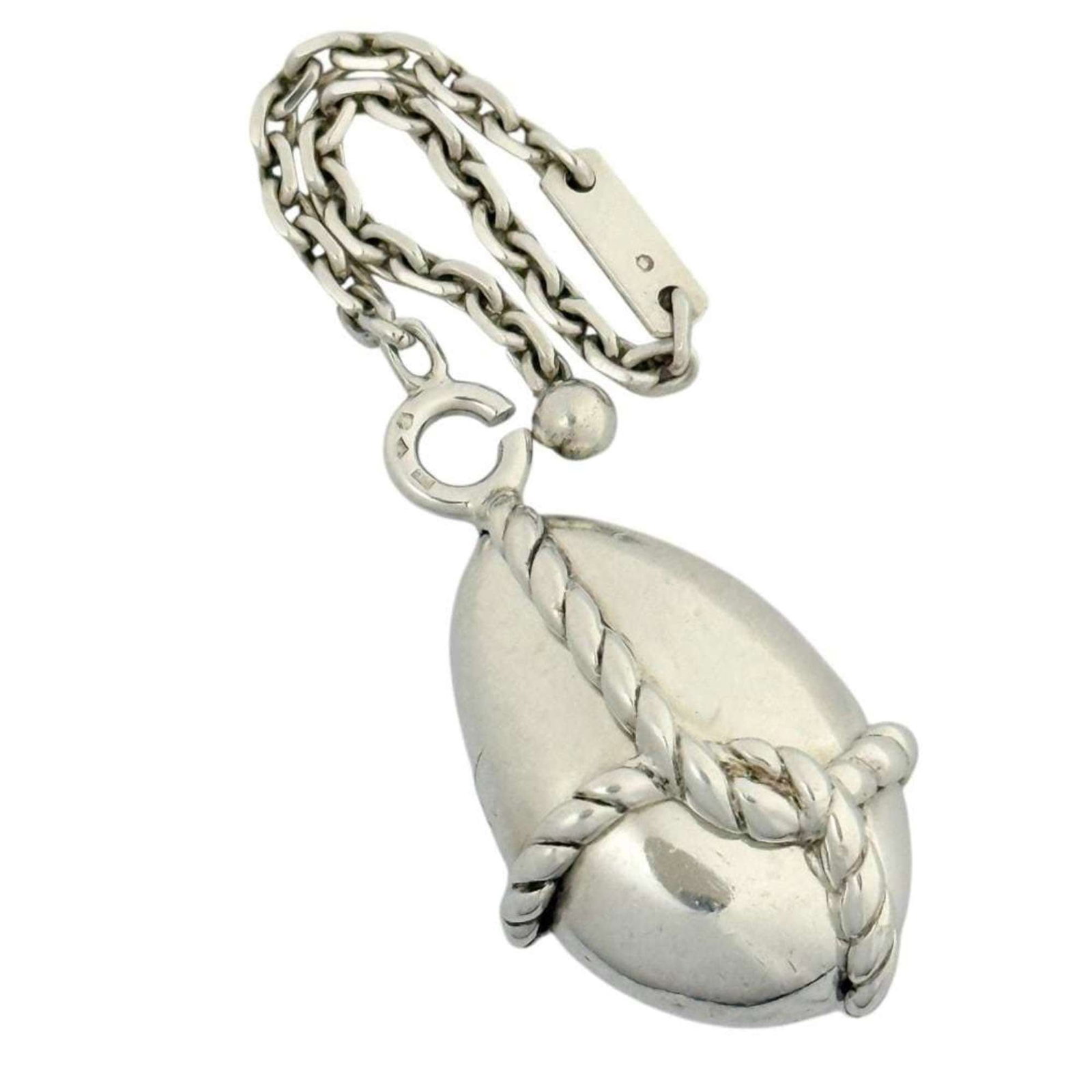 Handbag Charm Hermes Silver 925: Handbag Charm Hermes Silver 925 Silver 925 Handbag Charm from Hermes features a sleek design with a subtle sheen, adding a touch of sophistication to any outfit. The charm measures 115mm x 30mm and