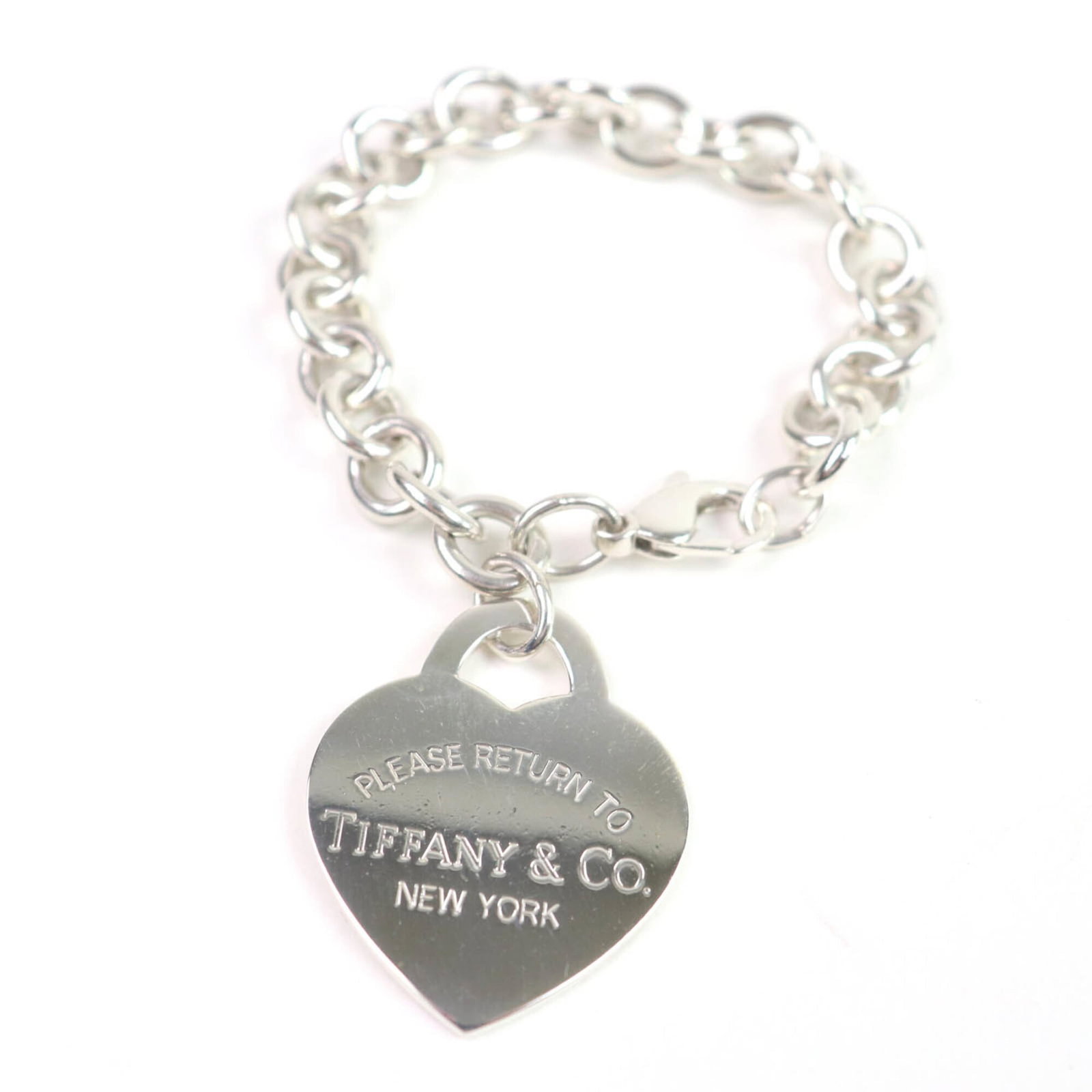 Charm Tiffany Bracelet 925 Silver: Charm Tiffany Bracelet 925 Silver Charm Tiffany Bracelet 925 Silver features a silver 925 material and has a length of 17cm / 6.69''. The bracelet bears traces of usage, scratches, and dirt but remain