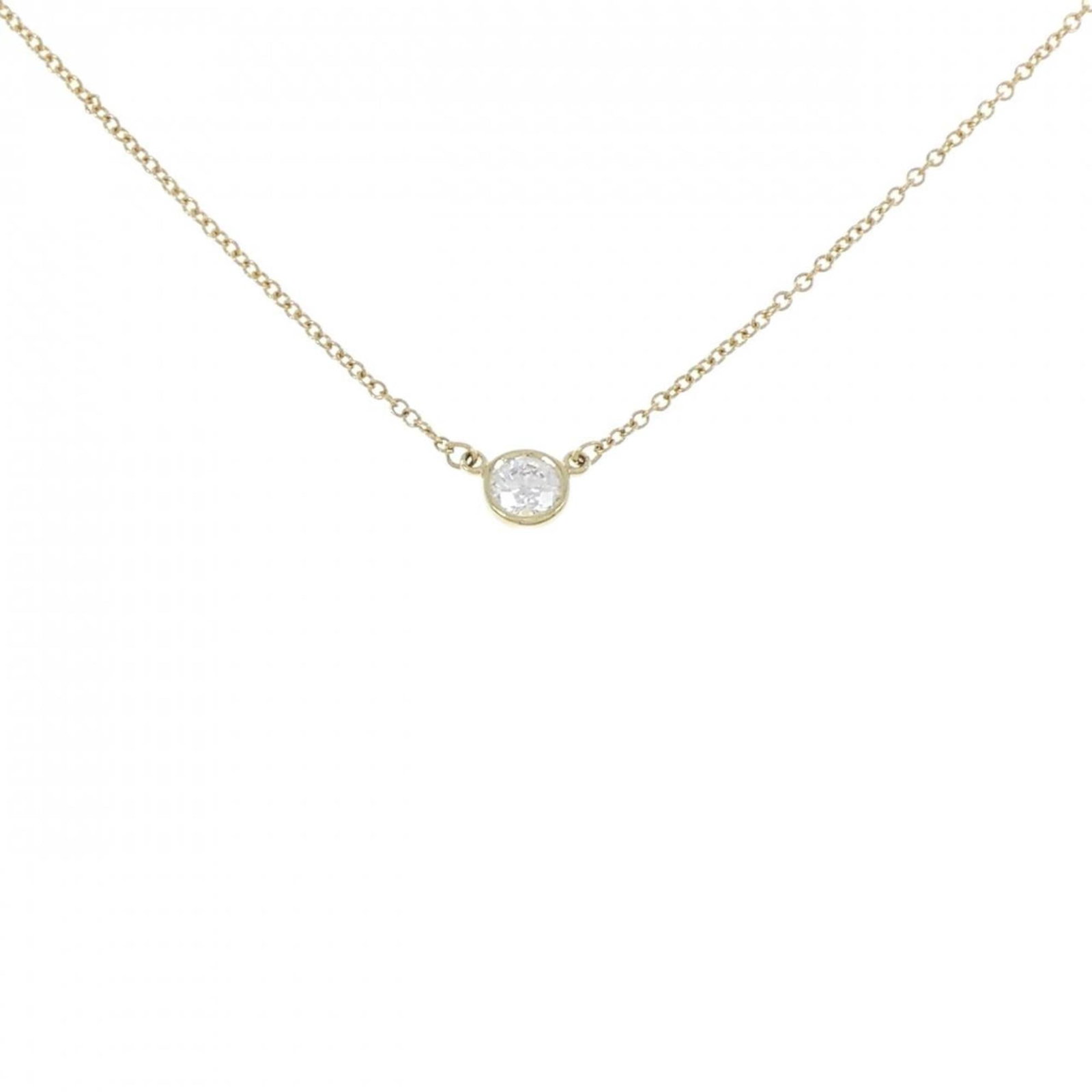 Tiffany by yard necklace: Tiffany by yard necklace Tiffany by yard necklace, featuring a 5mm diamond pendant set in 18K yellow gold. The necklace boasts a classic design with a 42cm circumference, perfect for everyday wear. Wi