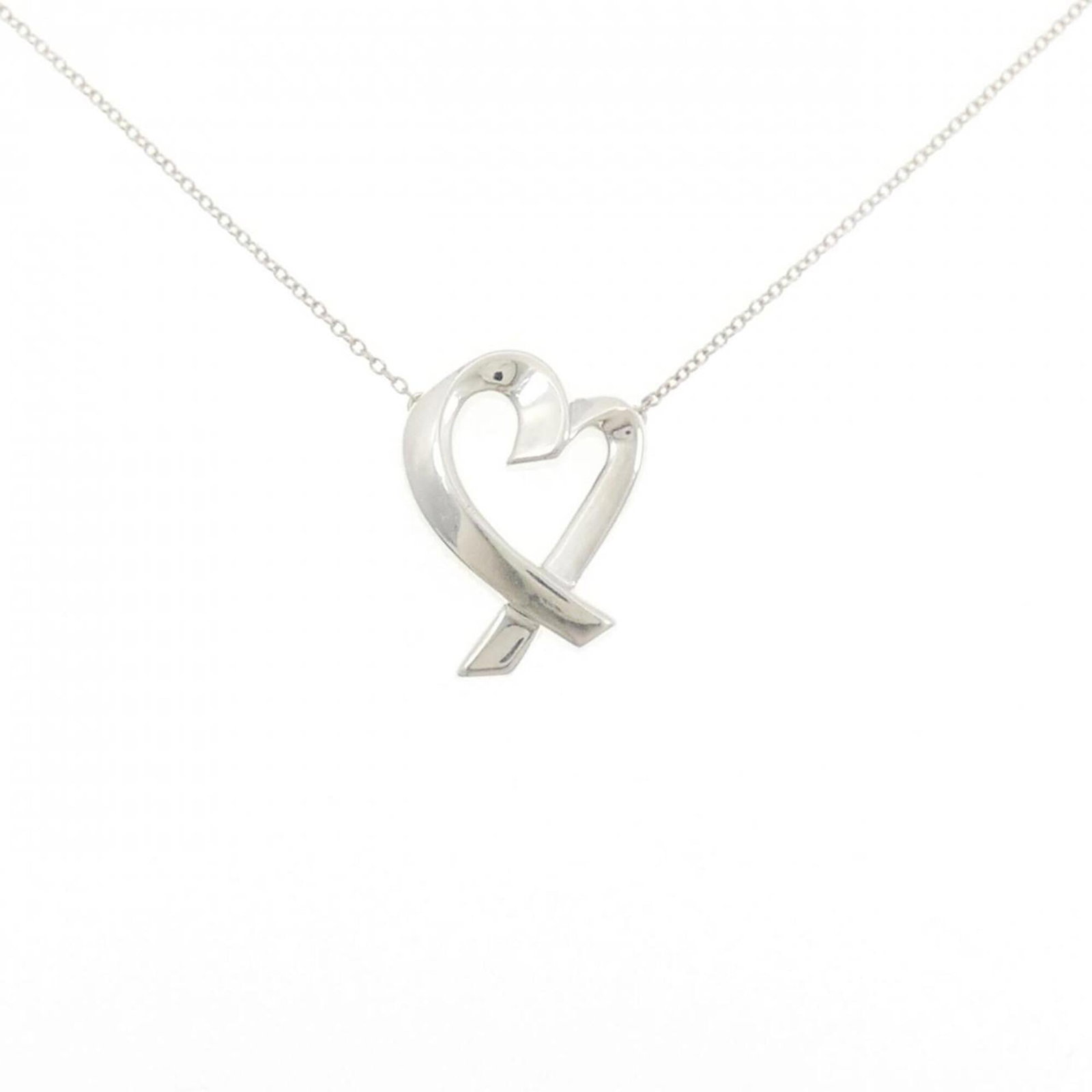 Loving Heart Necklace: Loving Heart Necklace The Loving Heart Necklace is a beautiful silver pendant, measuring 20.8mm x 15.7mm, set in a necklace with a 49 cm / 19.29'' circumference. This sterling silver piece bears a few