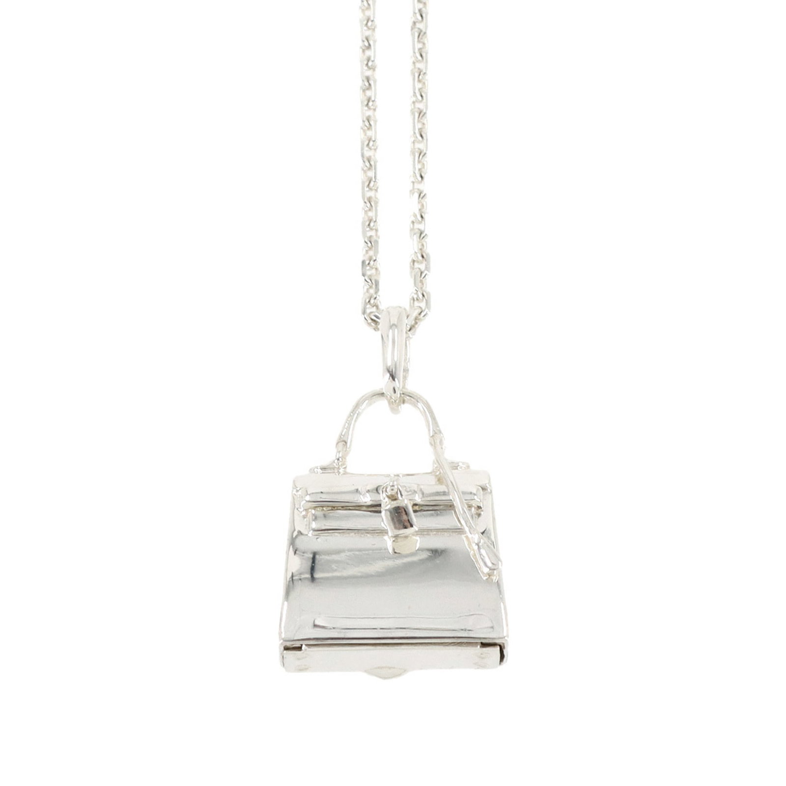 Silver Hermes Pendant Kelly Necklace Sv 925: Silver Hermes Pendant Kelly Necklace Sv 925 Silver Hermes Pendant Kelly Necklace Sv 925. This silver necklace features a beautiful pendant from the iconic Kelly design, crafted in sterling silver (Sv 