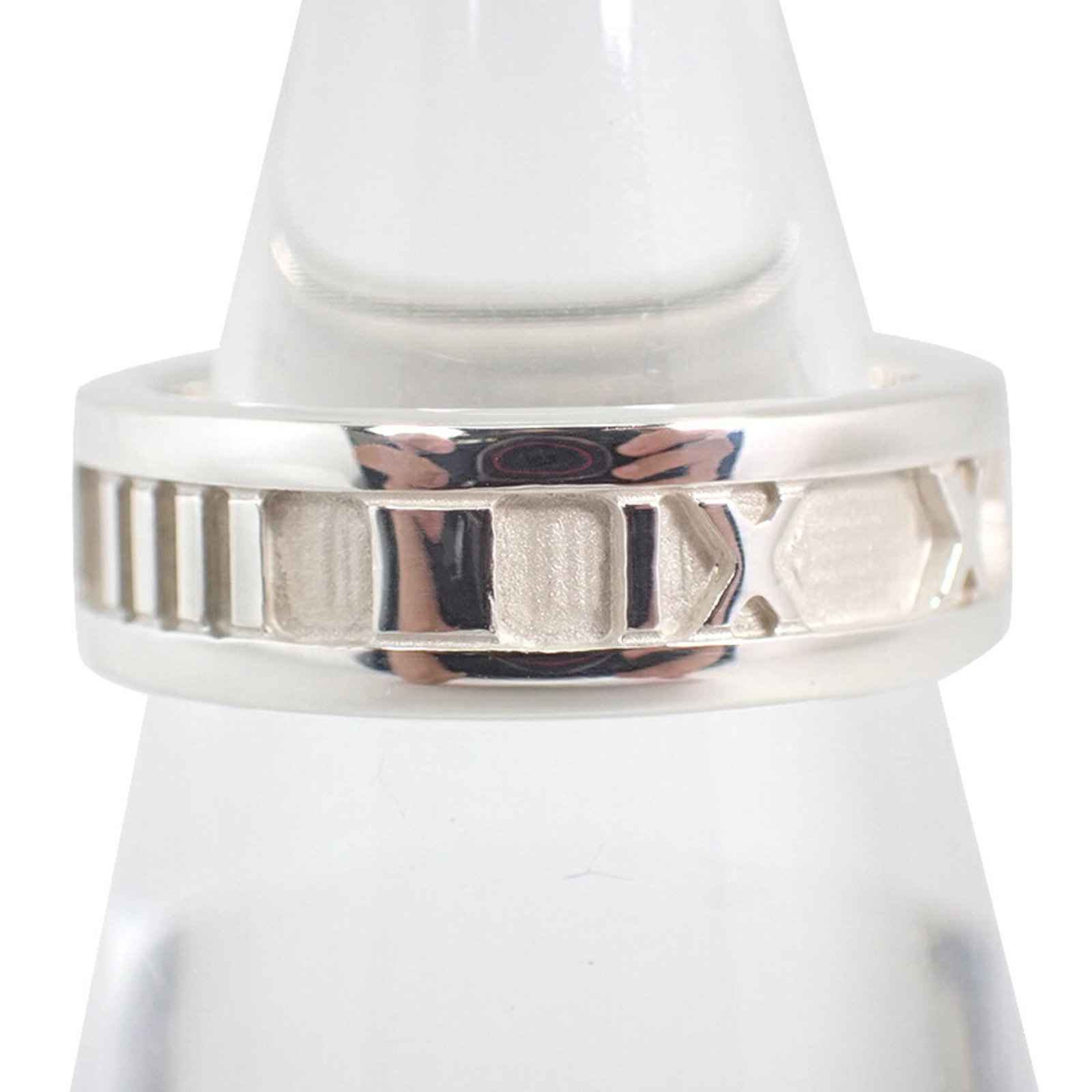 Sterling Silver Ring Tiffany Band: Sterling Silver Ring Tiffany Band Sterling silver Tiffany band ring in excellent condition, with hardly any signs of wear. This beautiful piece features the iconic Tiffany brand and is made from high-