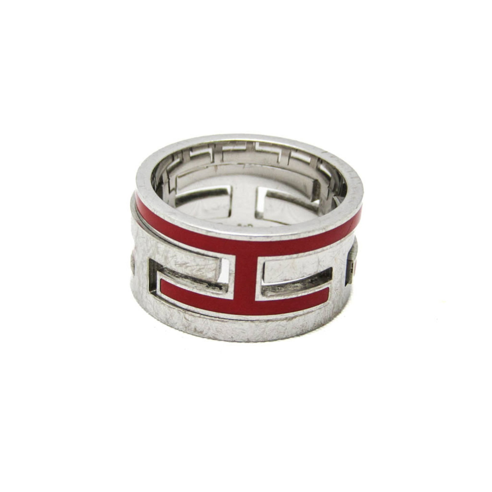 Ring Hermes Silver Band 925: Ring Hermes Silver Band 925 Silver band ring from Hermes featuring a classic design, available in a striking red color. Made from high-quality sterling silver (925), this casual band ring is a versati