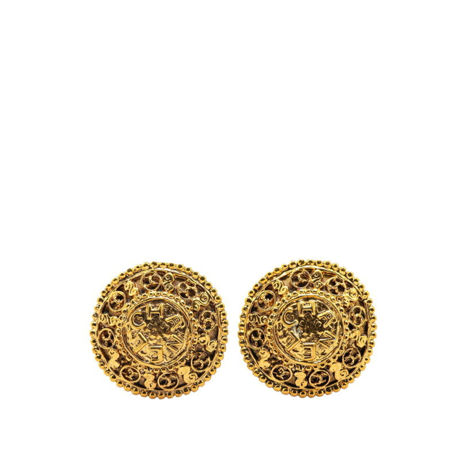 Women's round earrings gold plated with Chanel logo and mark.: Women's round earrings gold plated with Chanel logo and mark. Gold plated Chanel earrings with the iconic logo and mark, bearing subtle signs of use. The earrings showcase a classic design with a touc
