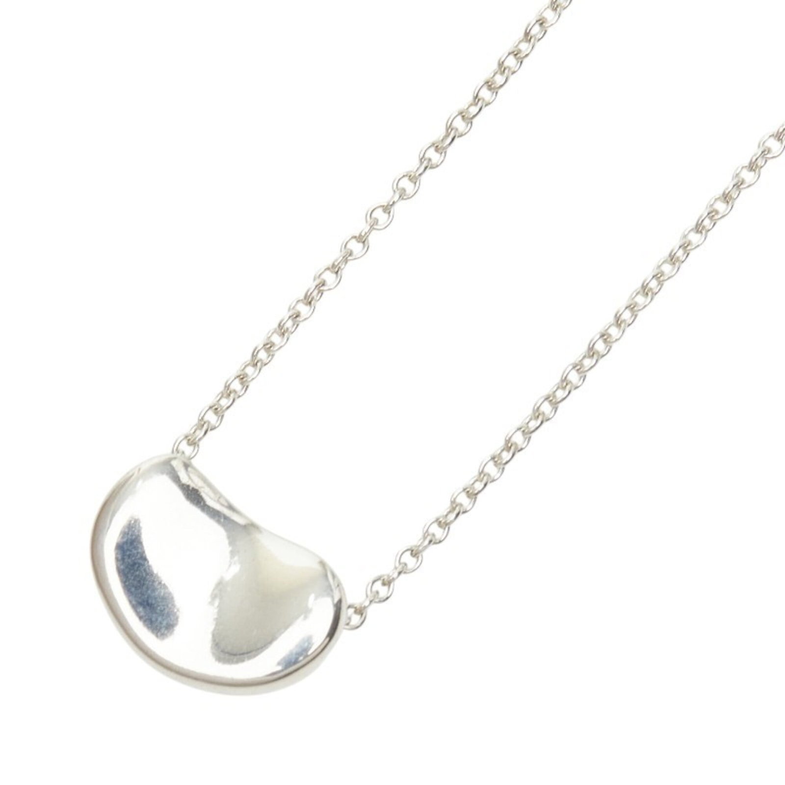 Women's silver Sv925 Bean Necklace Tiffany: Women's silver Sv925 Bean Necklace Tiffany Silver Sv925 Bean Necklace by Tiffany is a delicate, silver pendant featuring a distinctive bean-shaped design. Made from high-quality silver 925 material, t