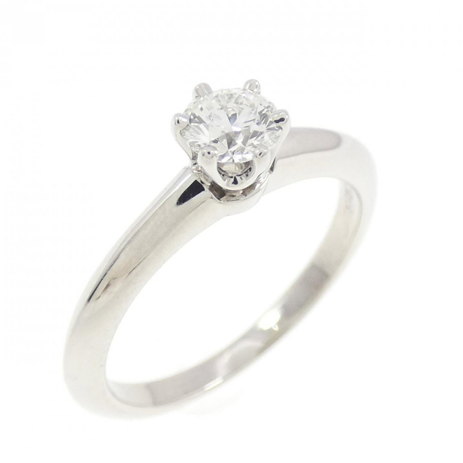 Platinum ring by Tiffany band: Platinum ring by Tiffany band Platinum ring by Tiffany features a diamond stone weighing 0.24 carats, set in a platinum band with a Vs1 clarity, available in size 3.5. This like-new condition ring boa