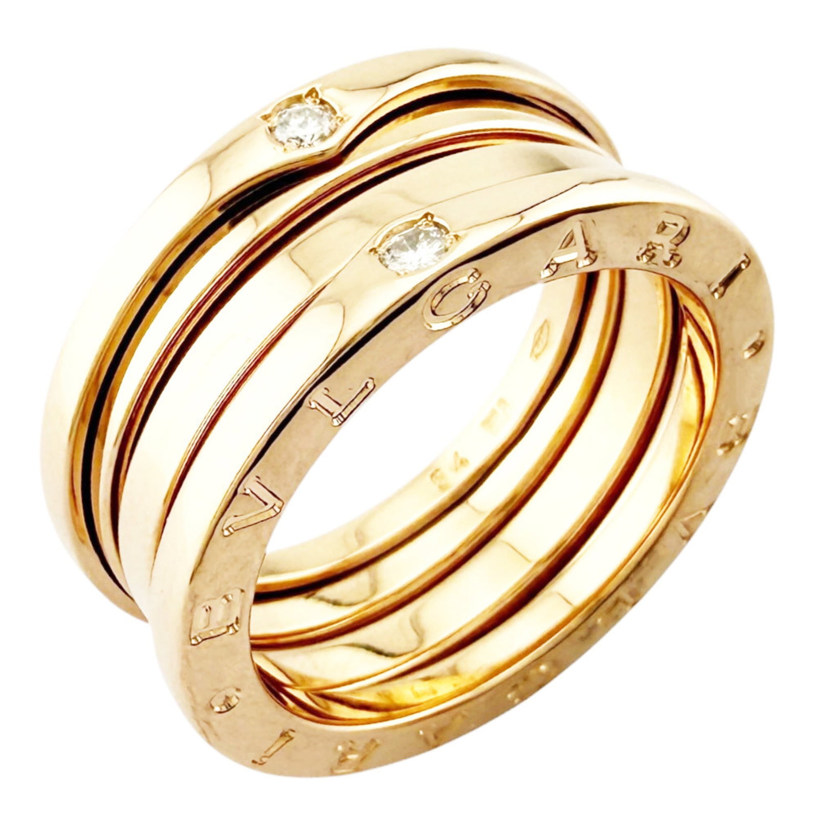 Pink Gold 18K Bvlgari Band Ring: Pink Gold 18K Bvlgari Band Ring Pink Gold 18K Bvlgari Band Ring features a stunning pink gold setting, adorned with a diamond stone. Handcrafted with attention to detail, this ring boasts an 8.5mm wid