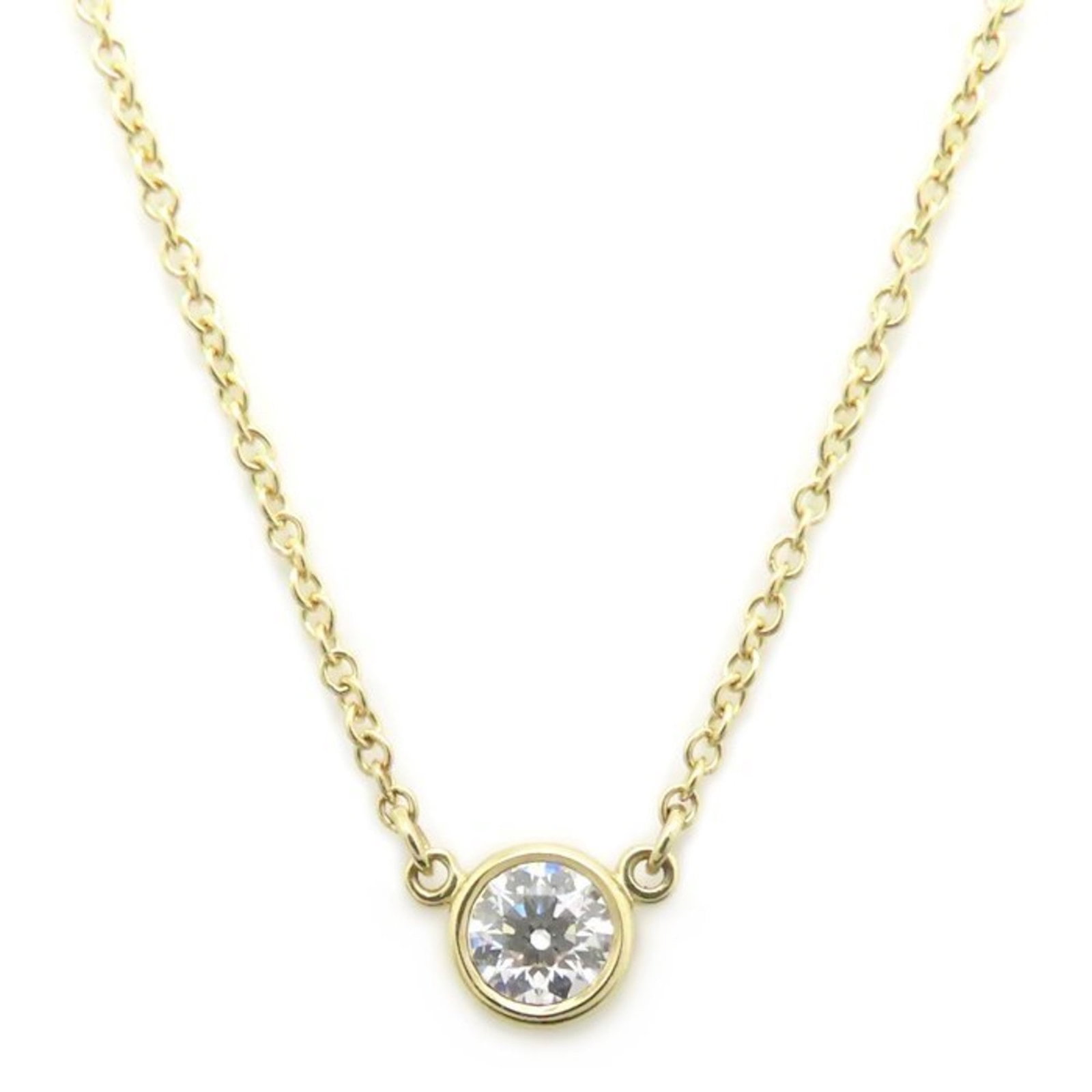 Elsa Peretti Design 18K Yellow Gold Women's 295273 By Yard Necklace 0.20Ct Diamond E.Si1 Excellent: Elsa Peretti Design 18K Yellow Gold Women's 295273 By Yard Necklace 0.20Ct Diamond E.Si1 Excellent 18K yellow gold necklace with a 0.20Ct diamond pendant, bearing the signature of Elsa Peretti Design.