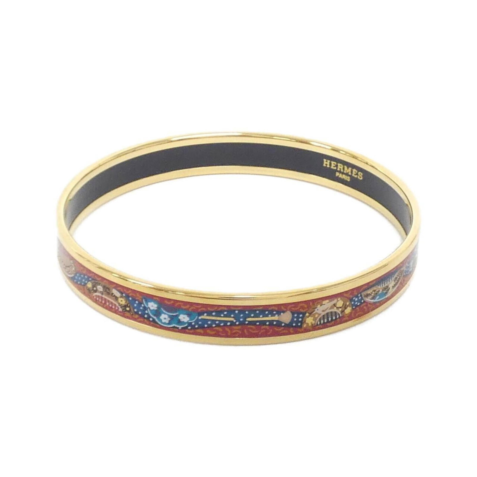 Hermes Bangle: Hermes Bangle Blue, Gold, Red Hermes Bangle. This used bangle boasts a striking color combination and features the iconic Hermes brand. Measuring 21cm in length, it showcases some minor scratches and 