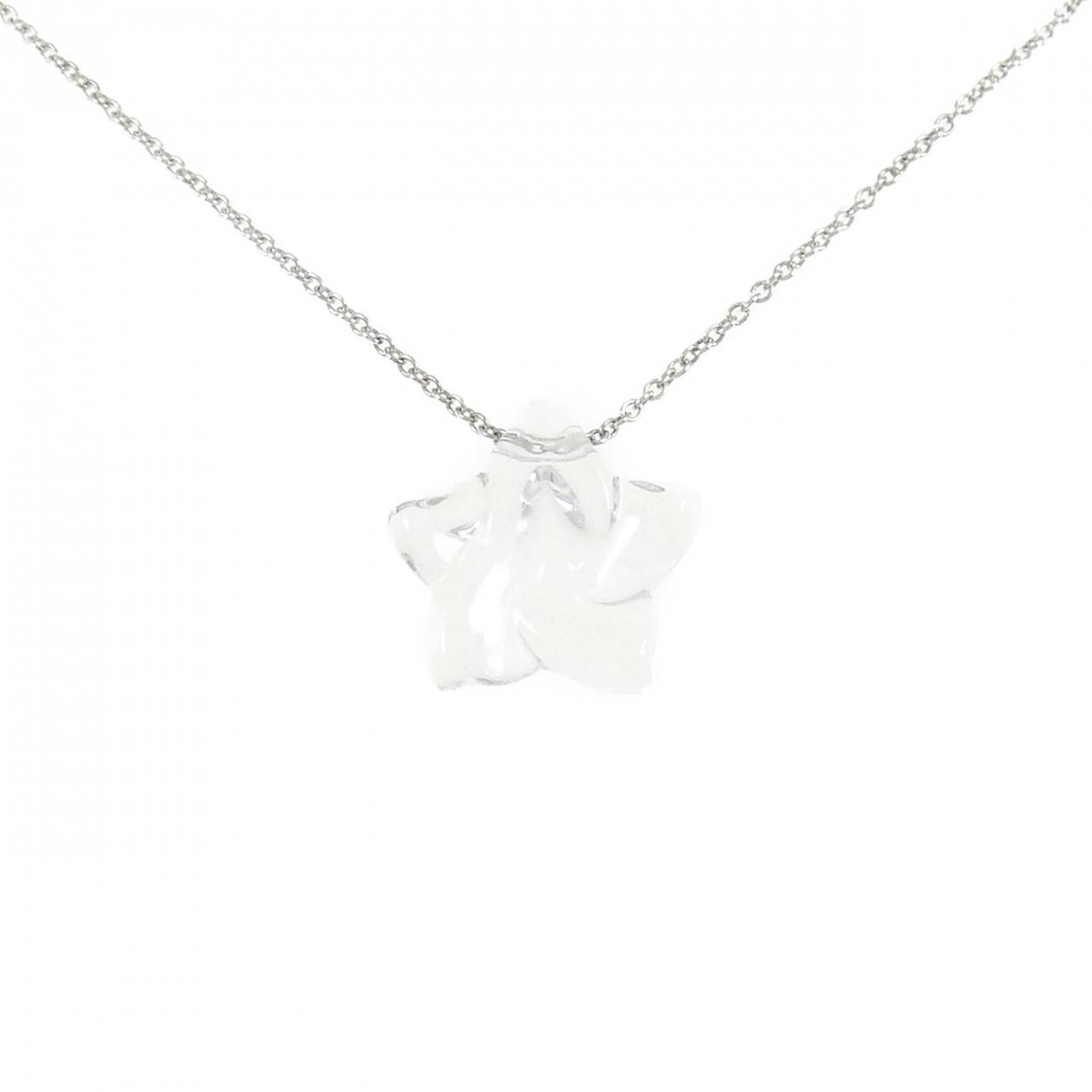 Tiffany Star Necklace: Tiffany Star Necklace Tiffany Star Necklace, crafted from sterling silver, features a crystal stone pendant suspended from a chain. The necklace boasts a classic design with a silver 925 material and