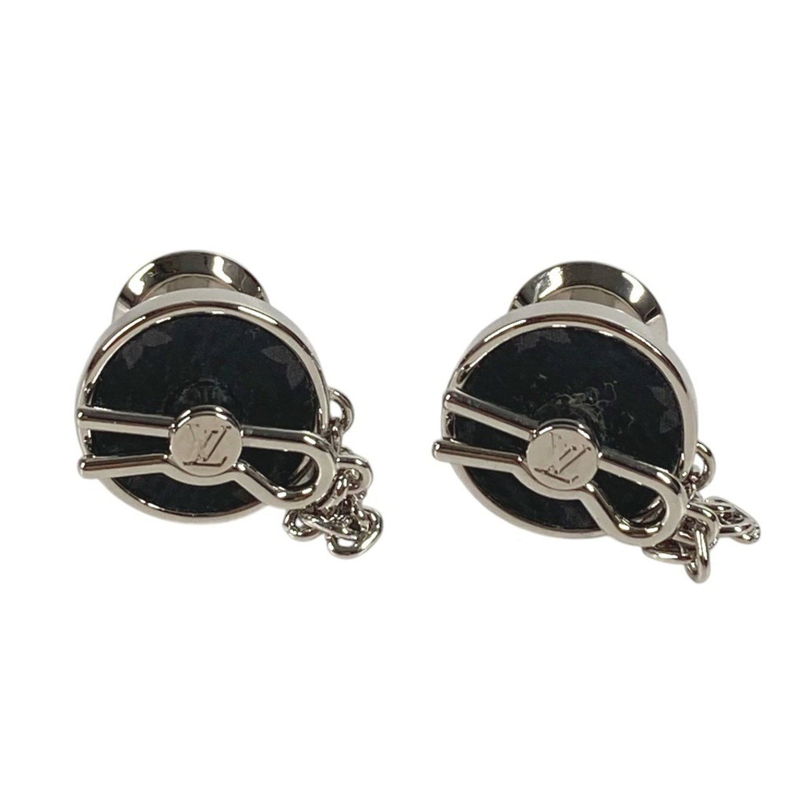 Louis Vuitton metal monogram cufflinks: Louis Vuitton metal monogram cufflinks Metal monogram cufflinks from Louis Vuitton, featuring the iconic Eclipse design in black and silver. The item bears traces of usage and minor scratches/dirt, bu