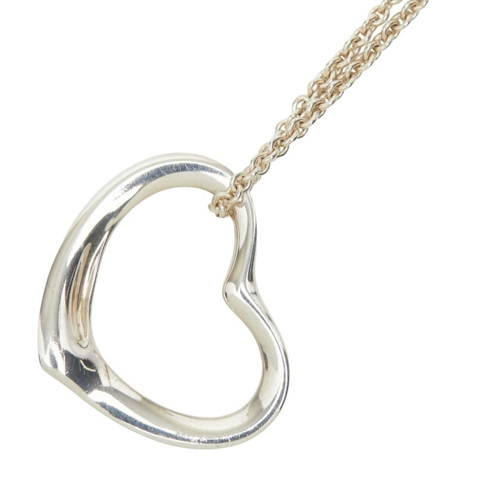 Tiffany and Co open heart necklace women's silver Sv925.: Tiffany and Co open heart necklace women's silver Sv925. Tiffany and Co open heart necklace in sterling silver, featuring a 40cm chain with an 18.6mm x 22.1mm pendant bearing the brand's signature. Th