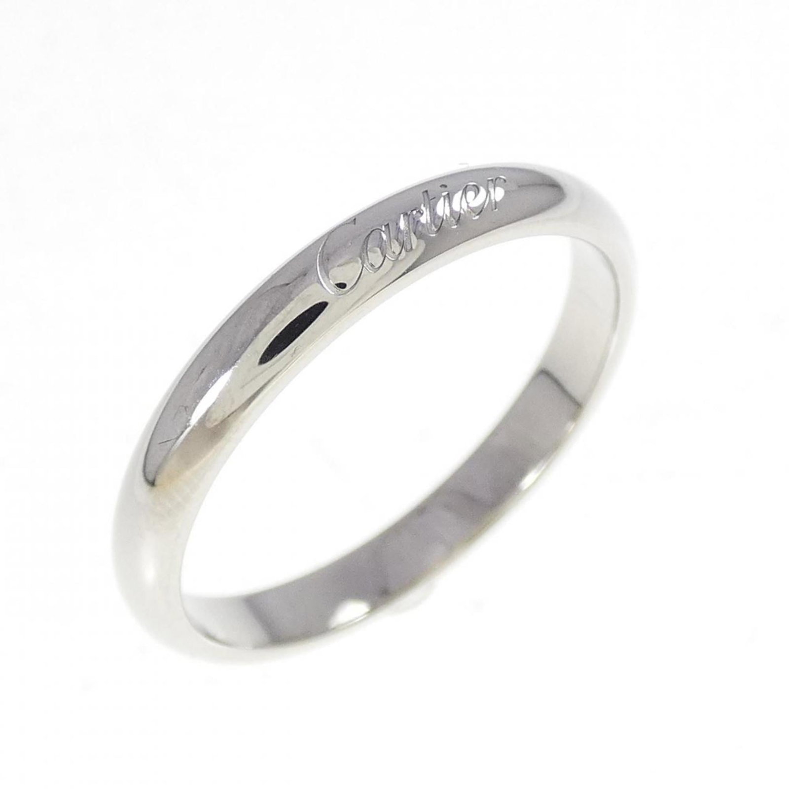 Ring Band by Platinum 950: Ring Band by Platinum 950 Platinum 950 band ring from Cartier, featuring a 57mm size and US Size 8.5 fit. This used item shows some traces of usage with minor scratches and dirt, but remains in very g