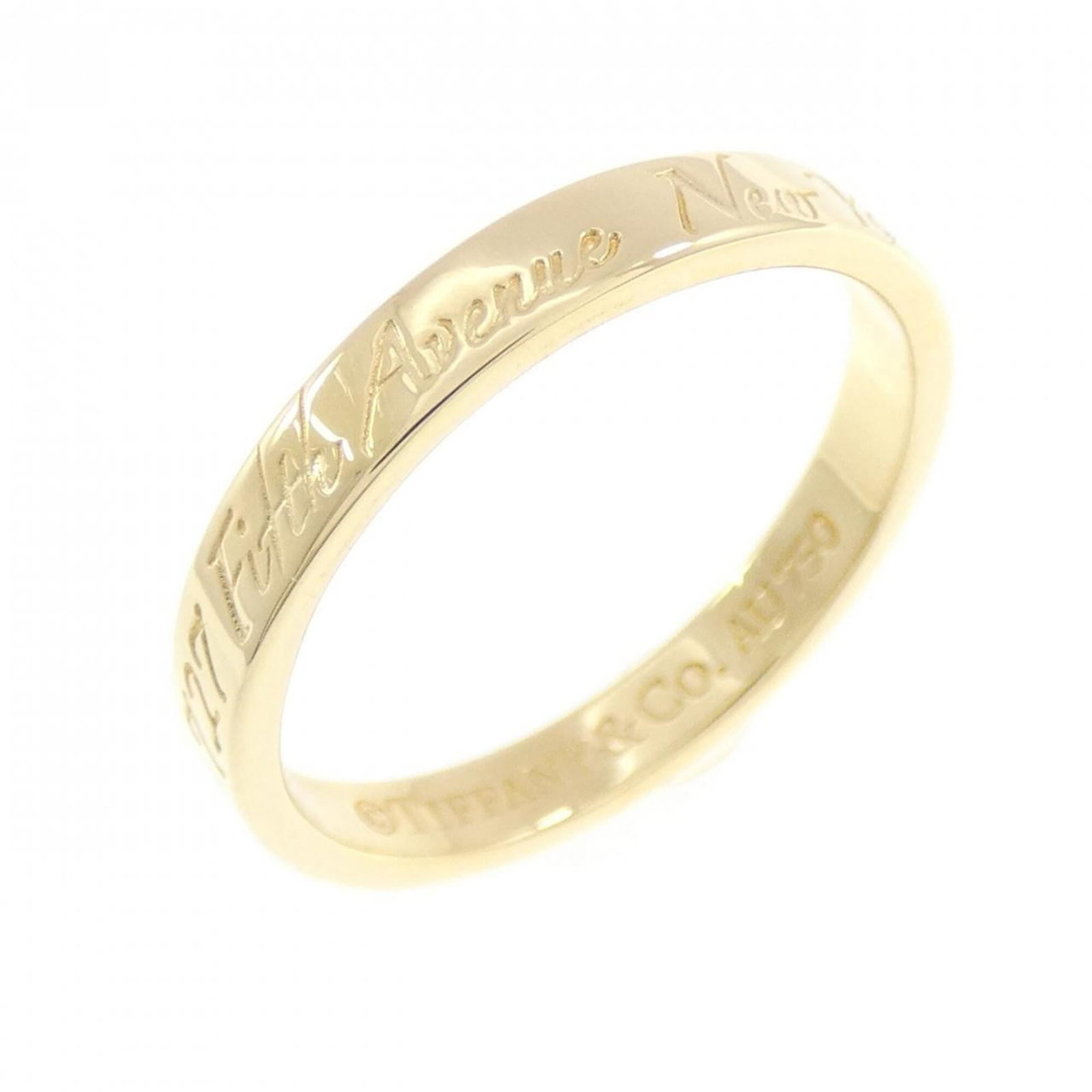 Tiffany Ring Gold Yellow 18K: Tiffany Ring Gold Yellow 18K Tiffany's iconic yellow gold band ring, crafted from 18K precious metal. This lovely piece boasts a classic design with subtle elegance, making it a timeless addition to a